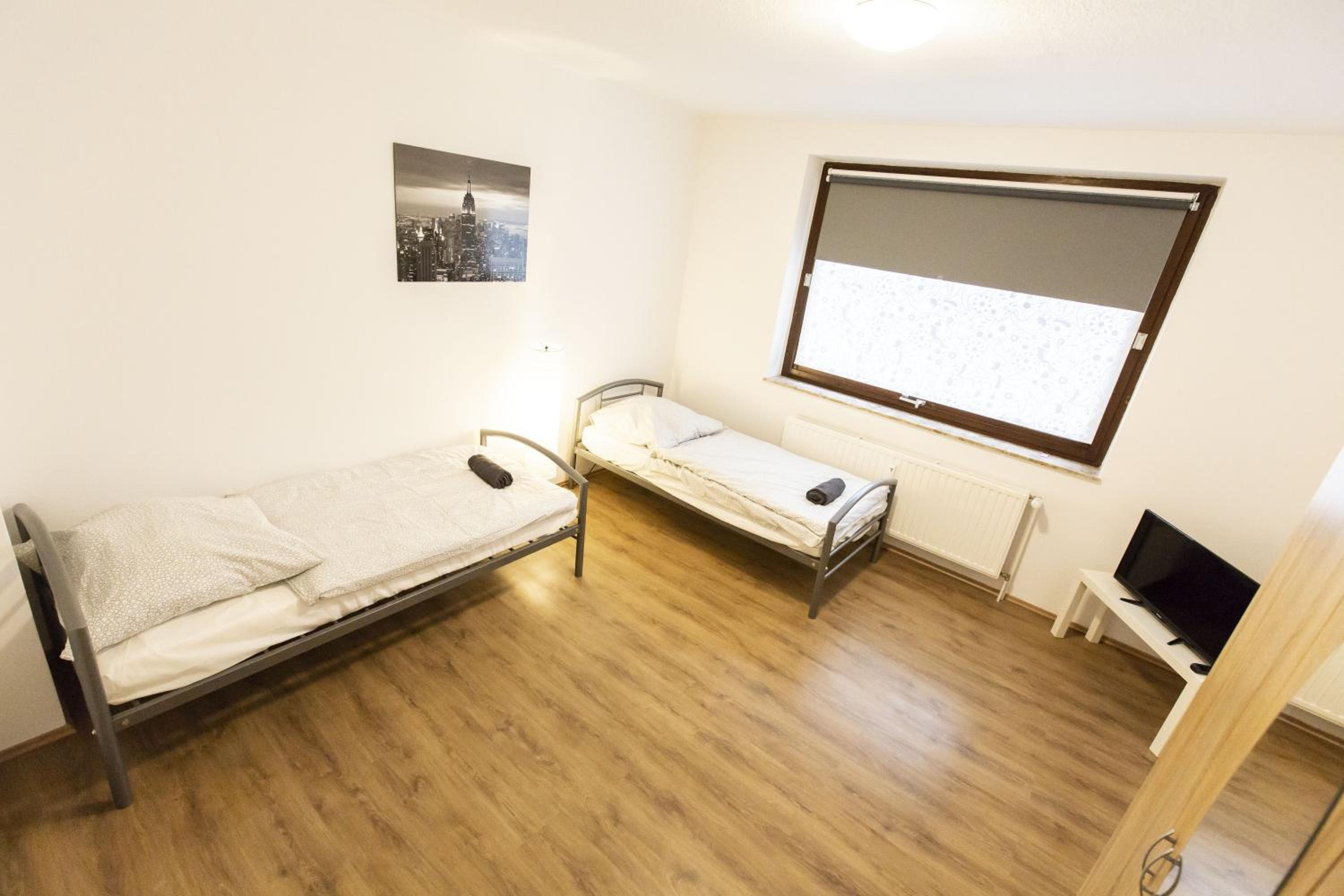 Three-Bedroom Apartment - Photo 21