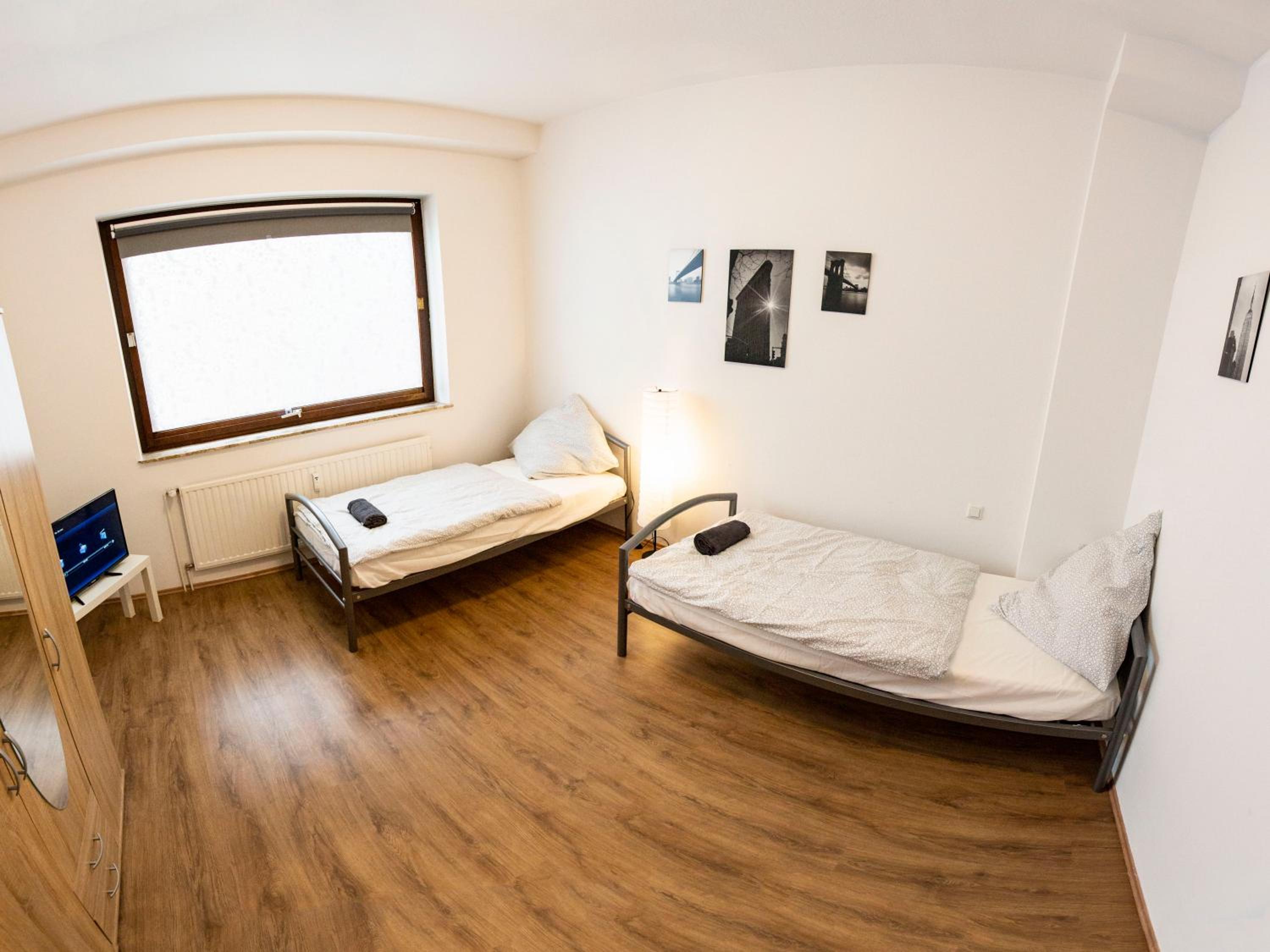 Three-Bedroom Apartment - Photo 2