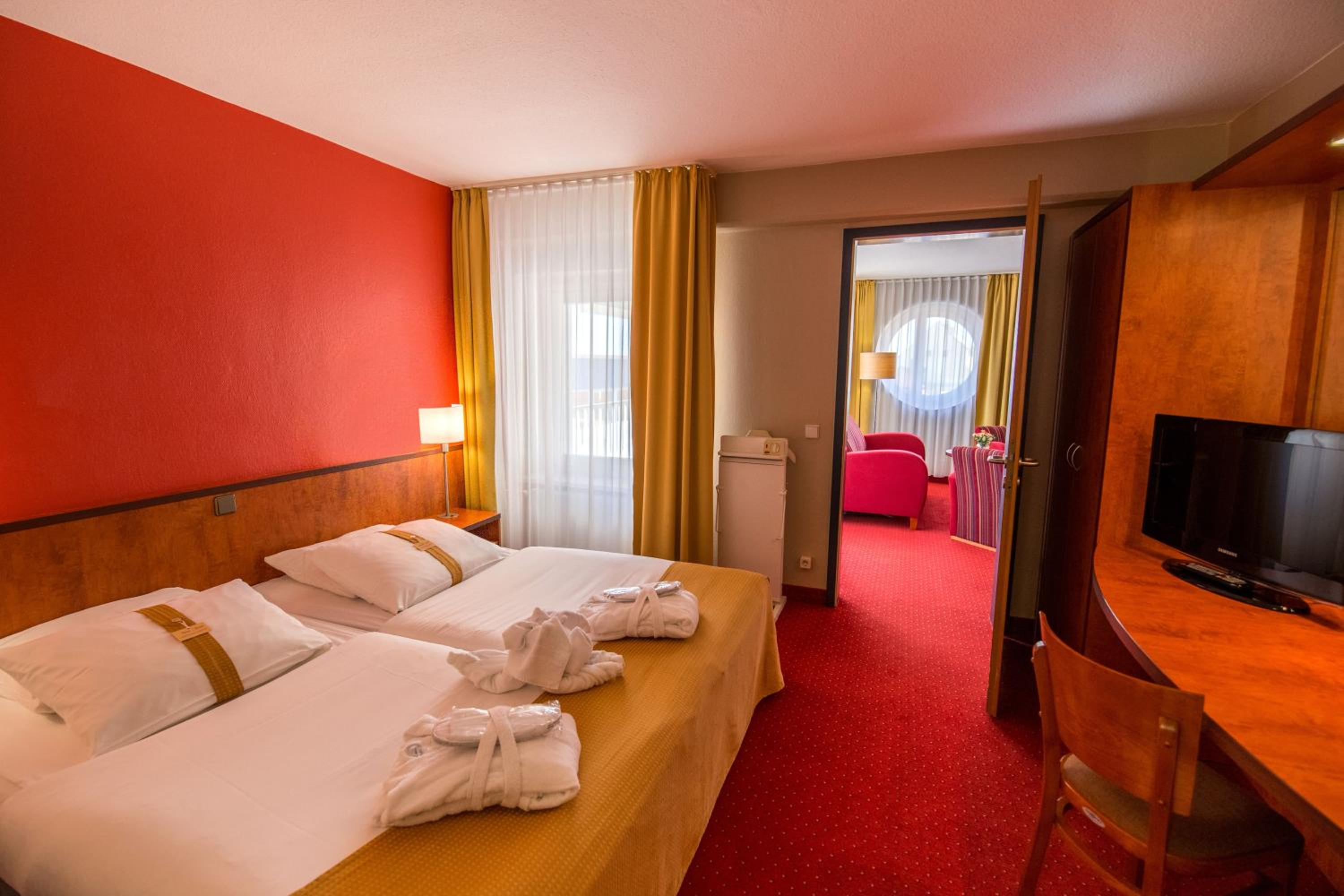 King Suite with Balcony - Photo 13