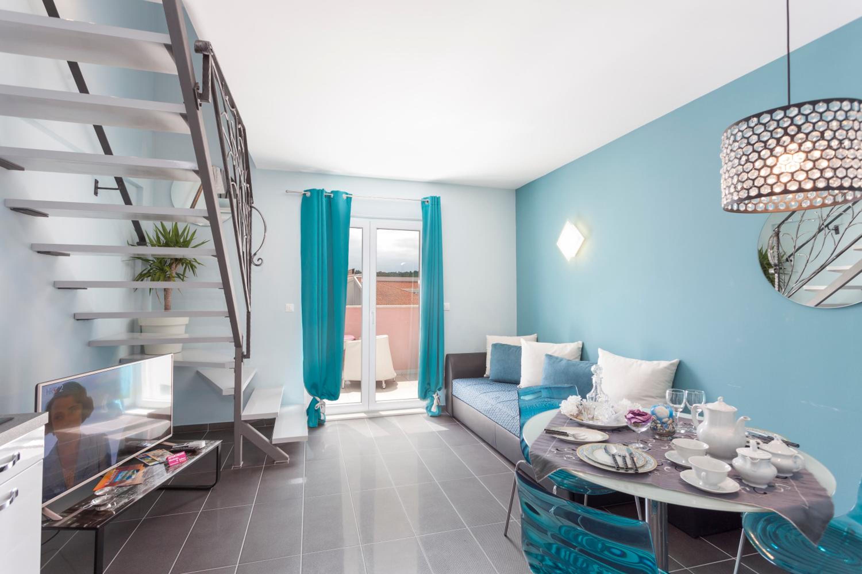 Duplex One-Bedroom Apartment with Balcony and Sea View