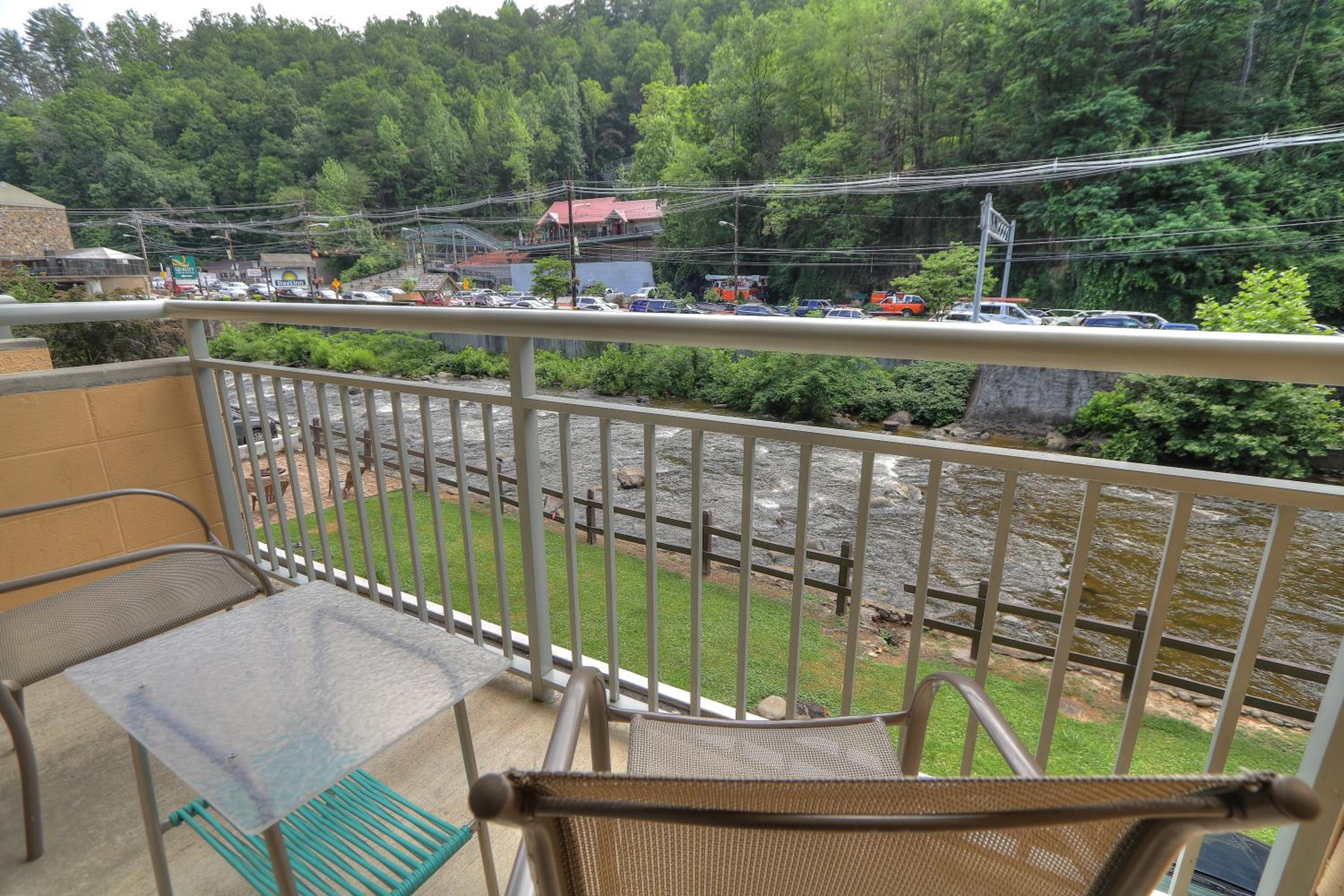 Connecting Room: 4 Queen Beds. Riverview Balcony. at Gatlinburg River Inn in Gatlinburg