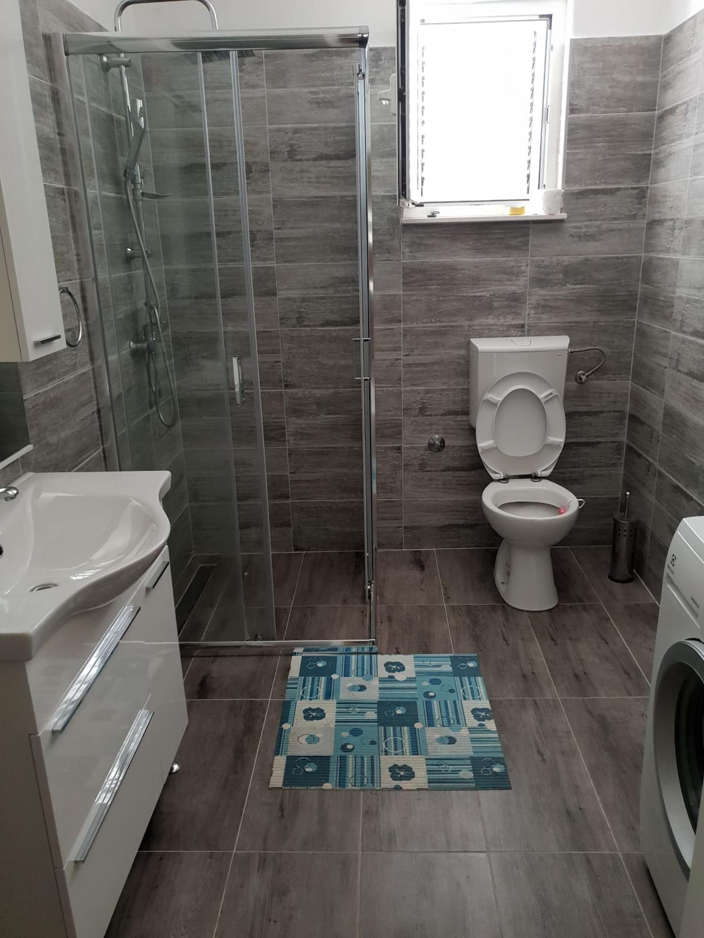 Three-Bedroom Apartment - Photo 9