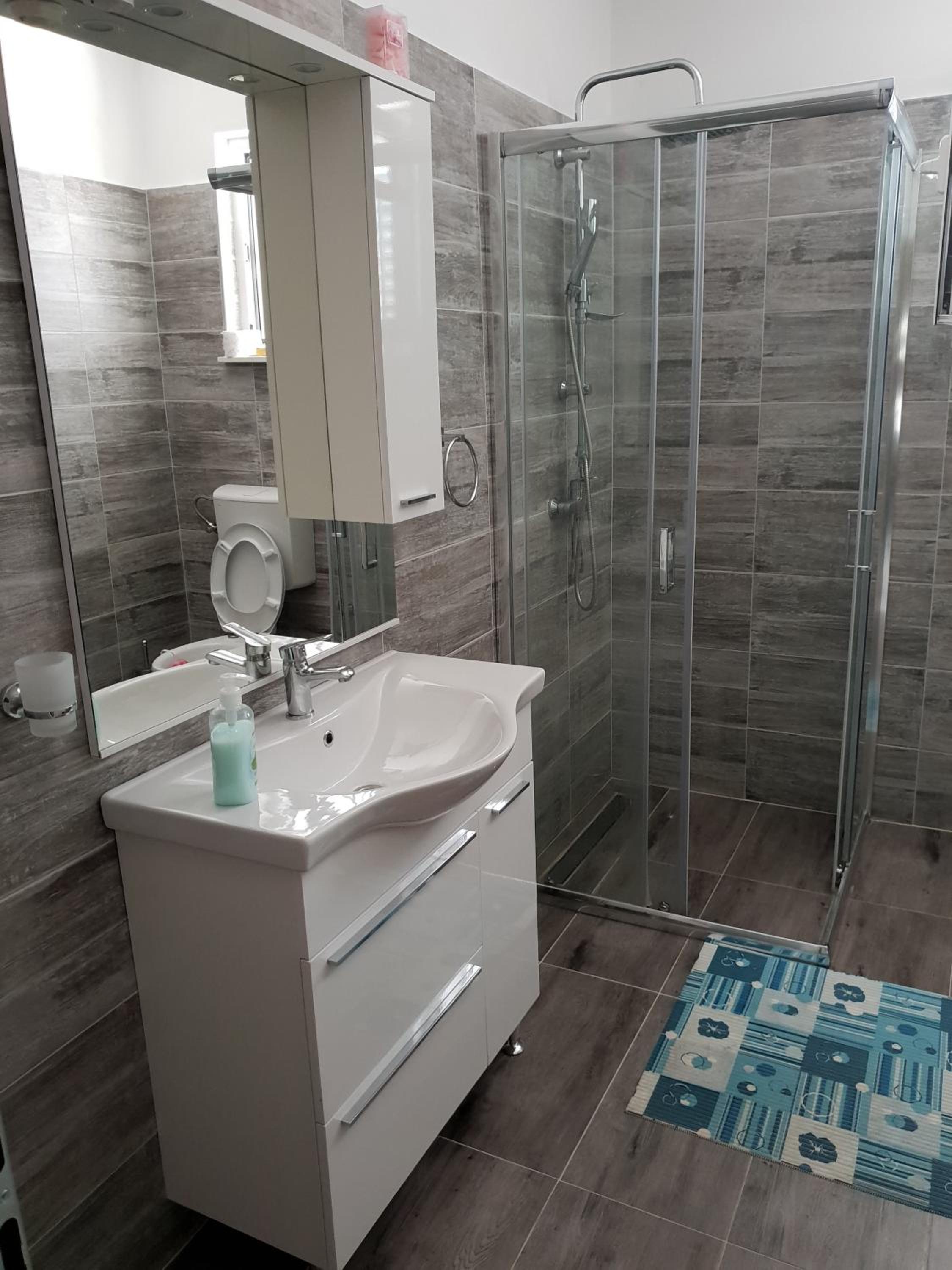 Three-Bedroom Apartment - Photo 10