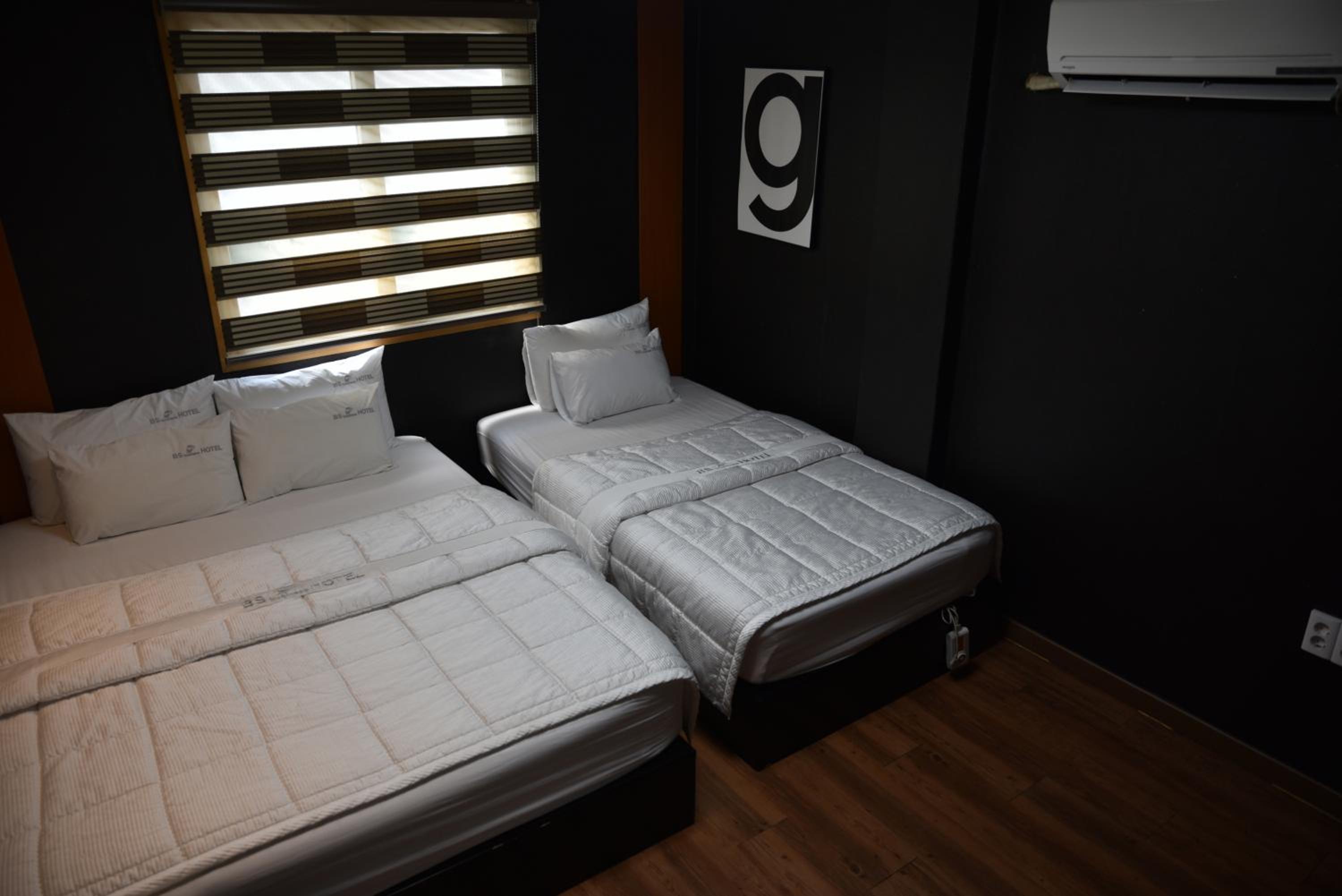 Deluxe Triple Room - Photo 1