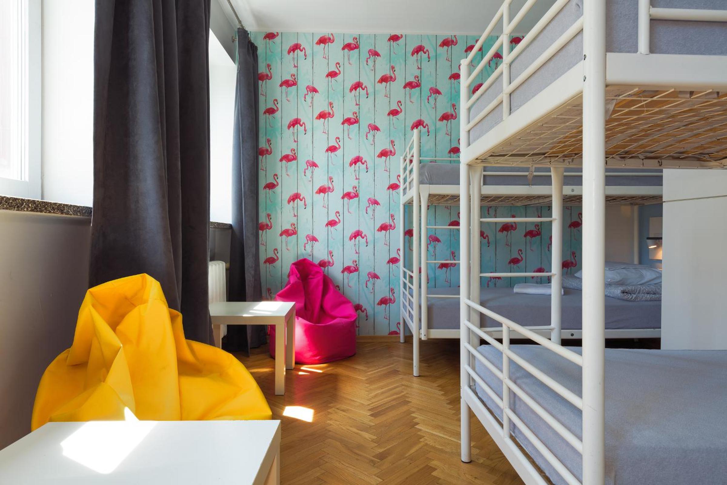 Bed in 6-Bed Dormitory Room with Shared Bathroom