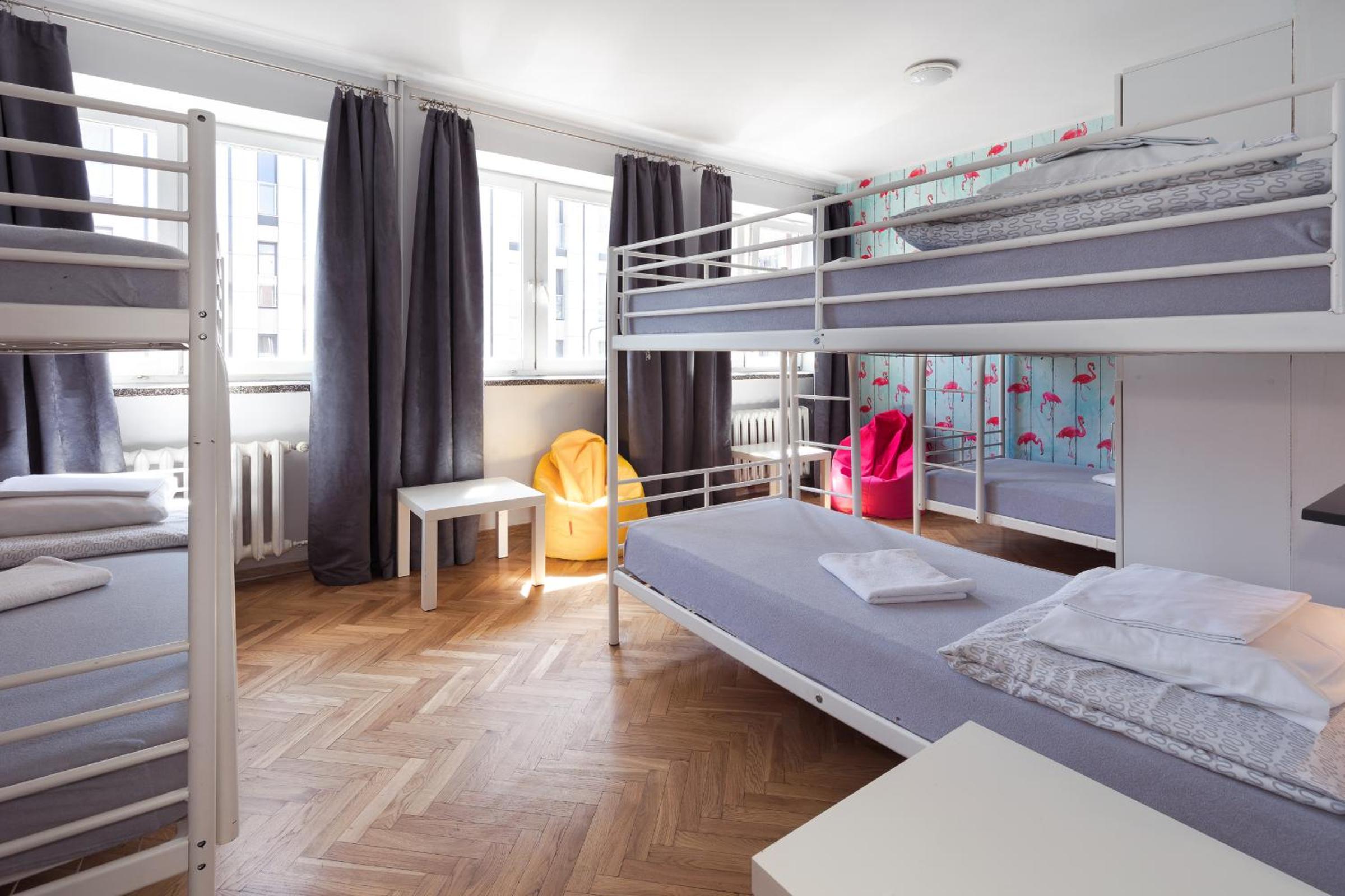 Bed in 6-Bed Dormitory Room with Shared Bathroom