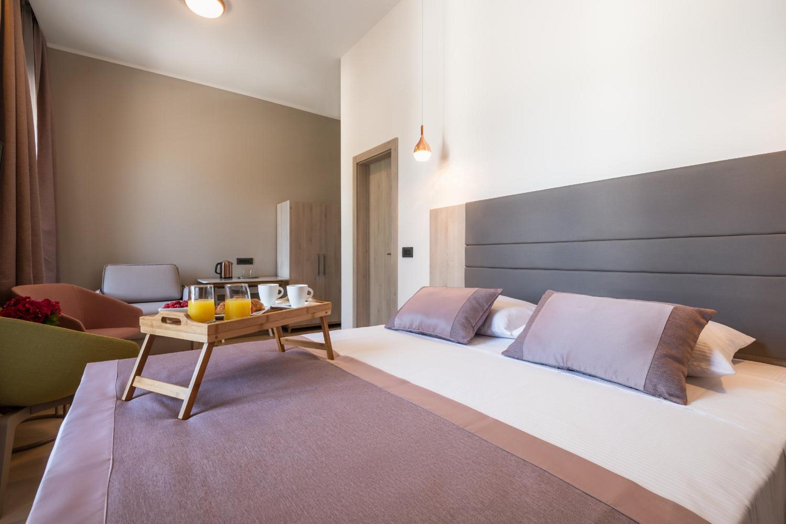 De Luxe Doppelzimmer mit Balkon und Meerblick