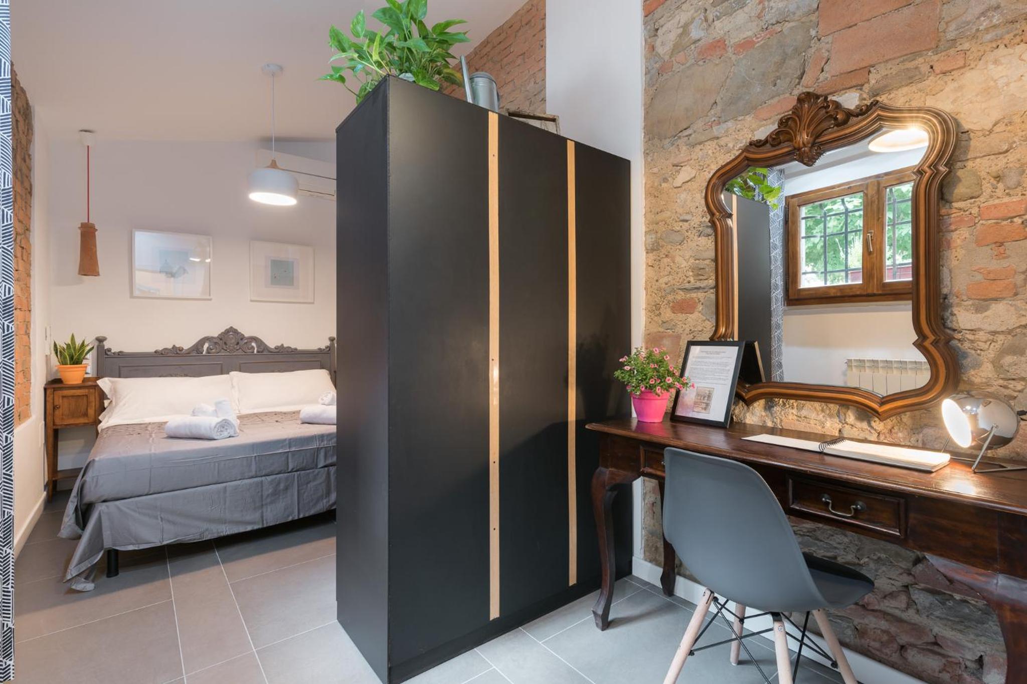 Deluxe One-Bedroom Apartment with Garden View