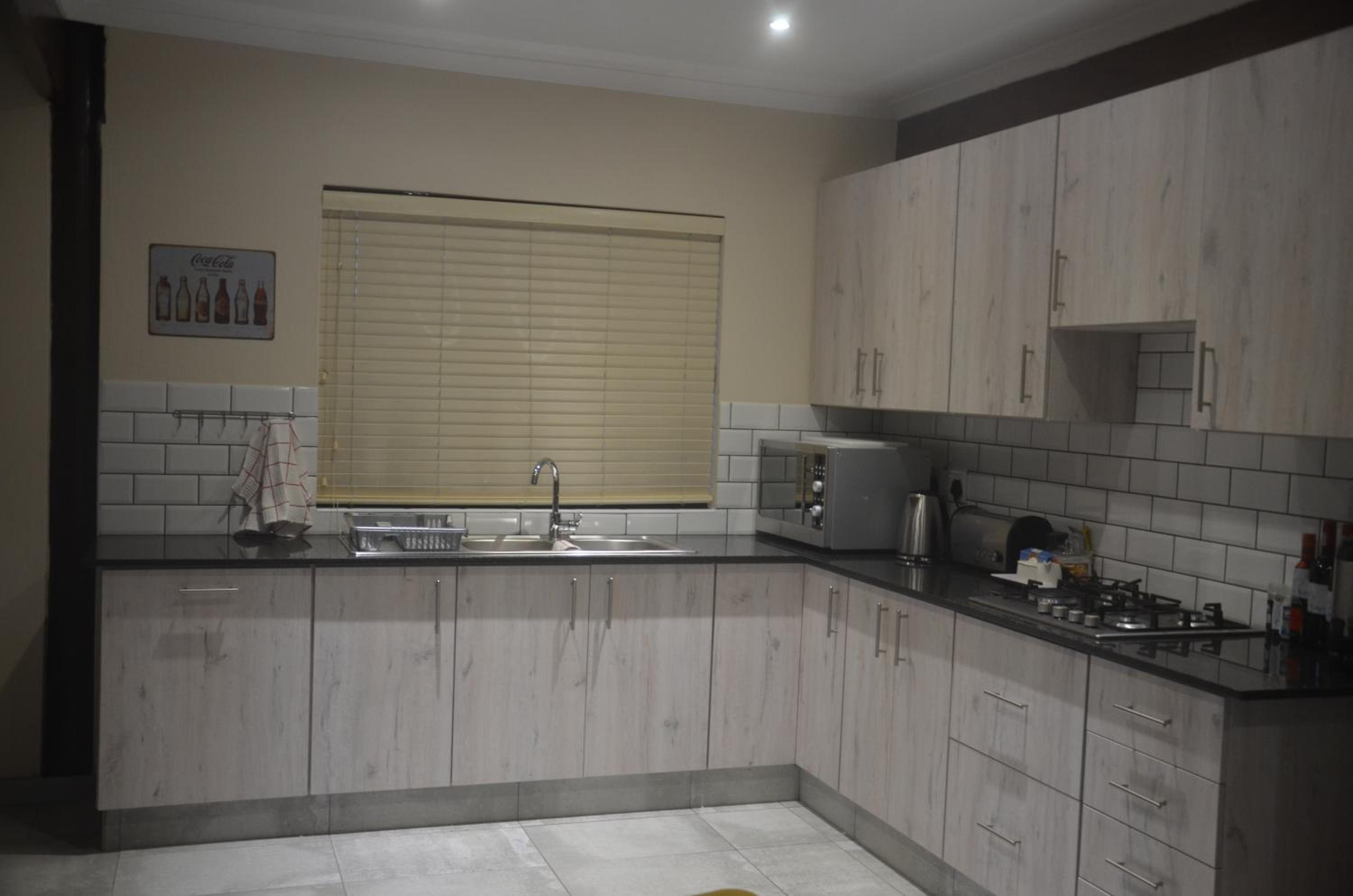 Three-Bedroom Apartment - Photo 26