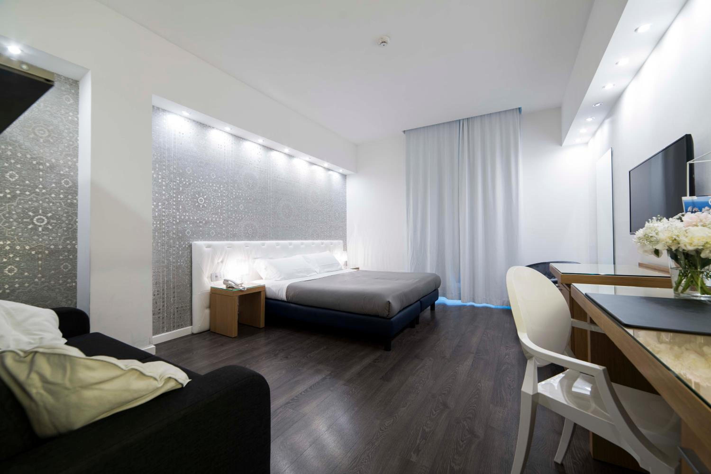 Deluxe Quadruple Room - Photo 6
