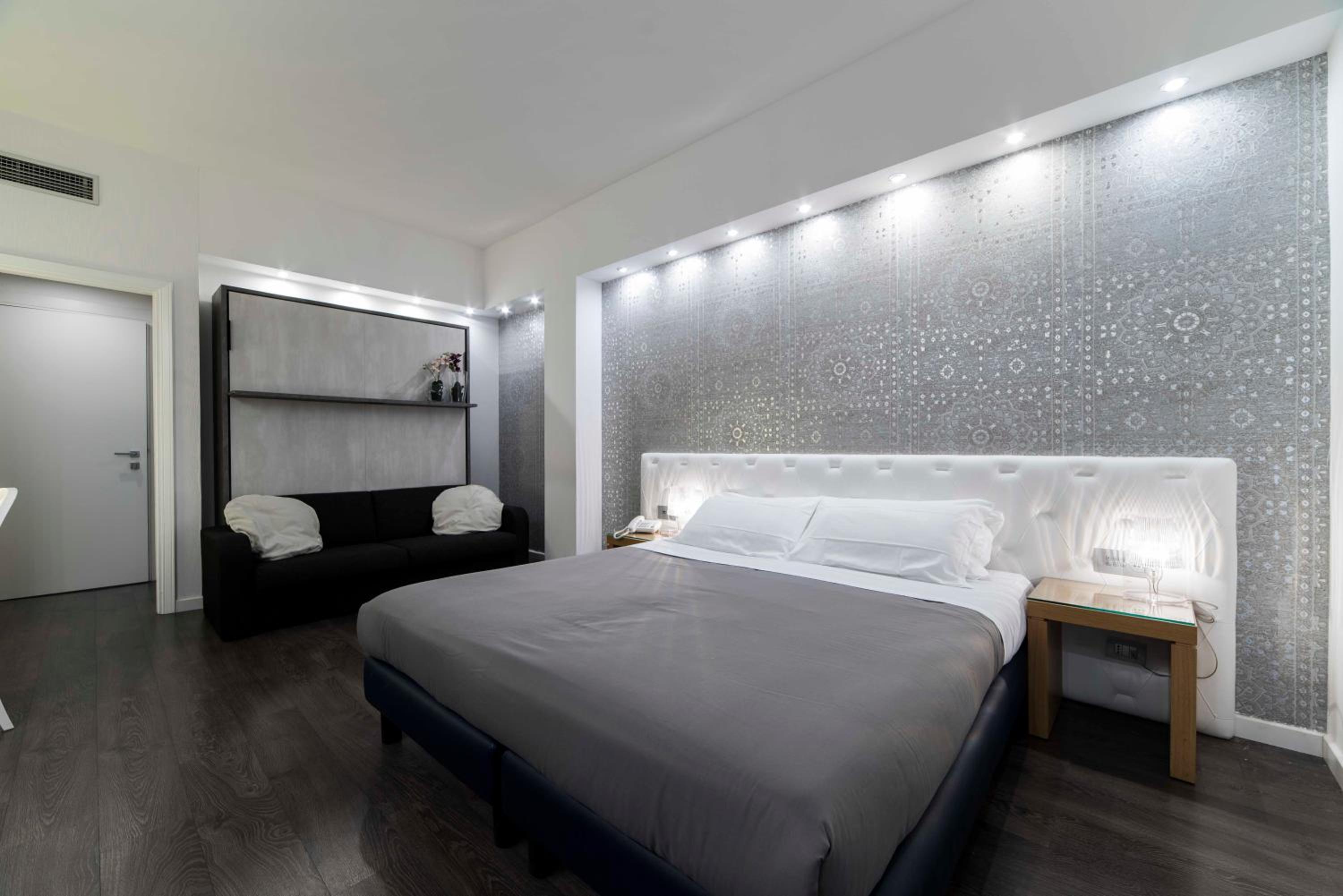 Deluxe Quadruple Room - Photo 7