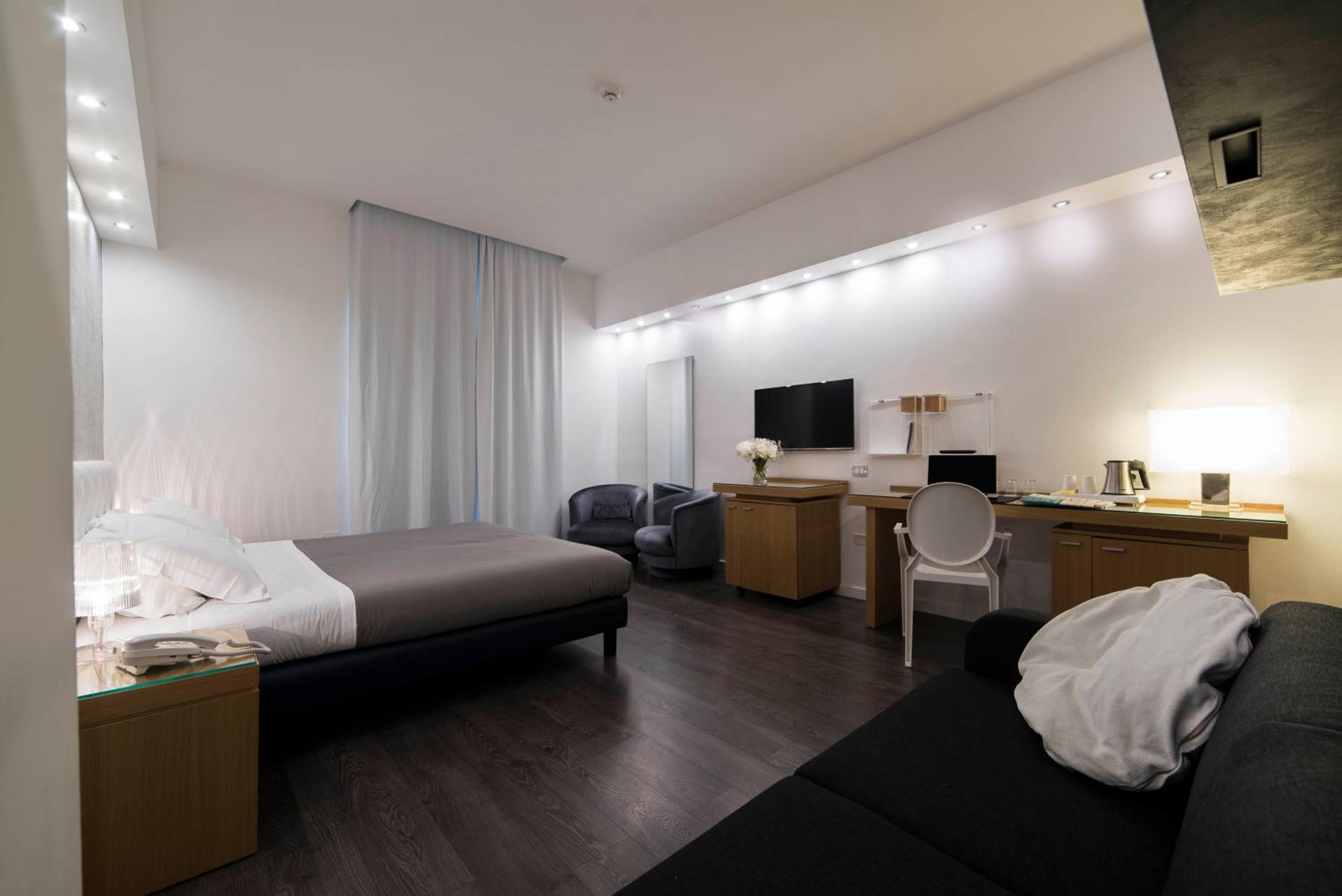 Deluxe Quadruple Room - Photo 3