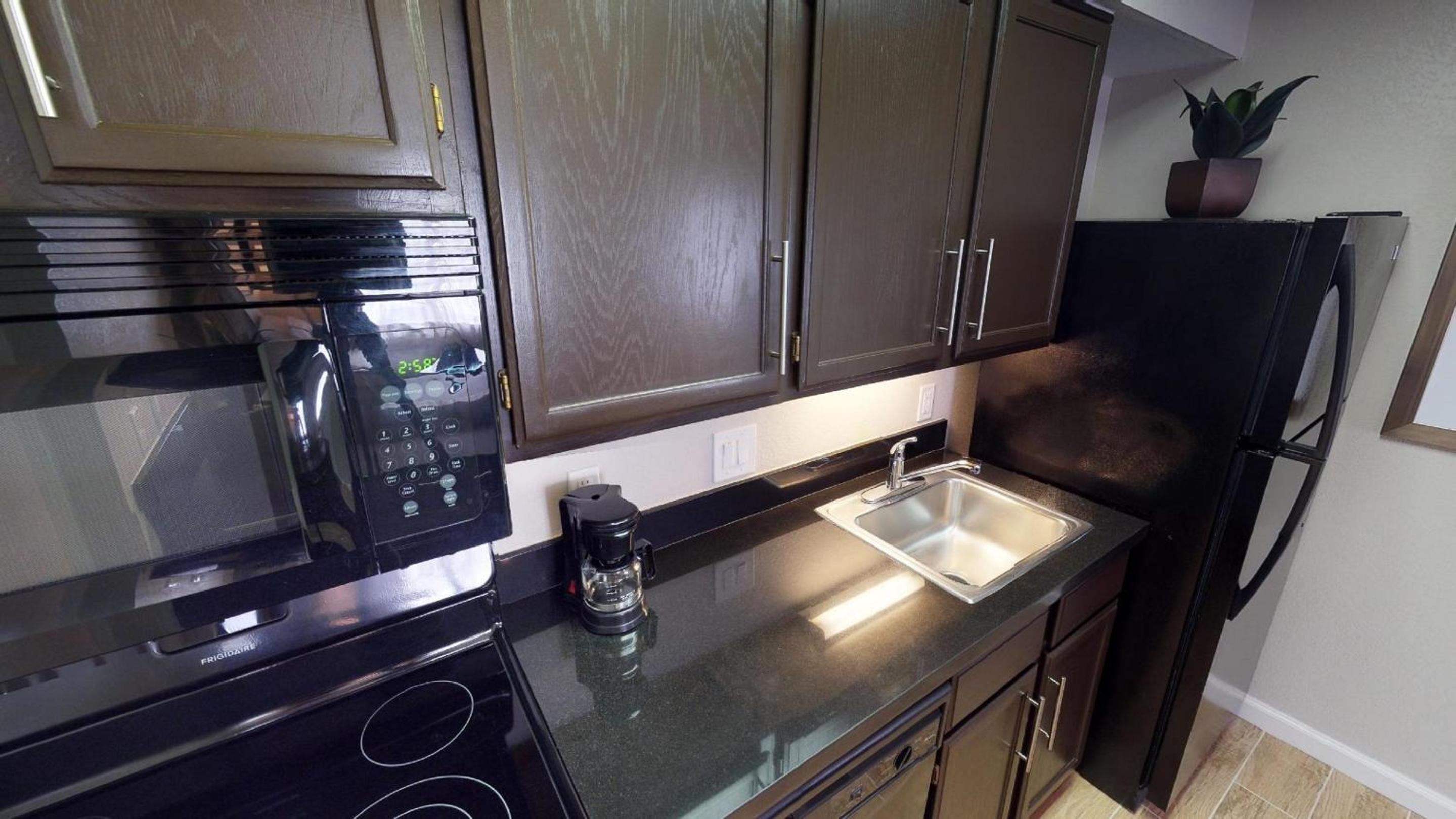 One Bedroom Suite - Full Kitchen - Photo 13