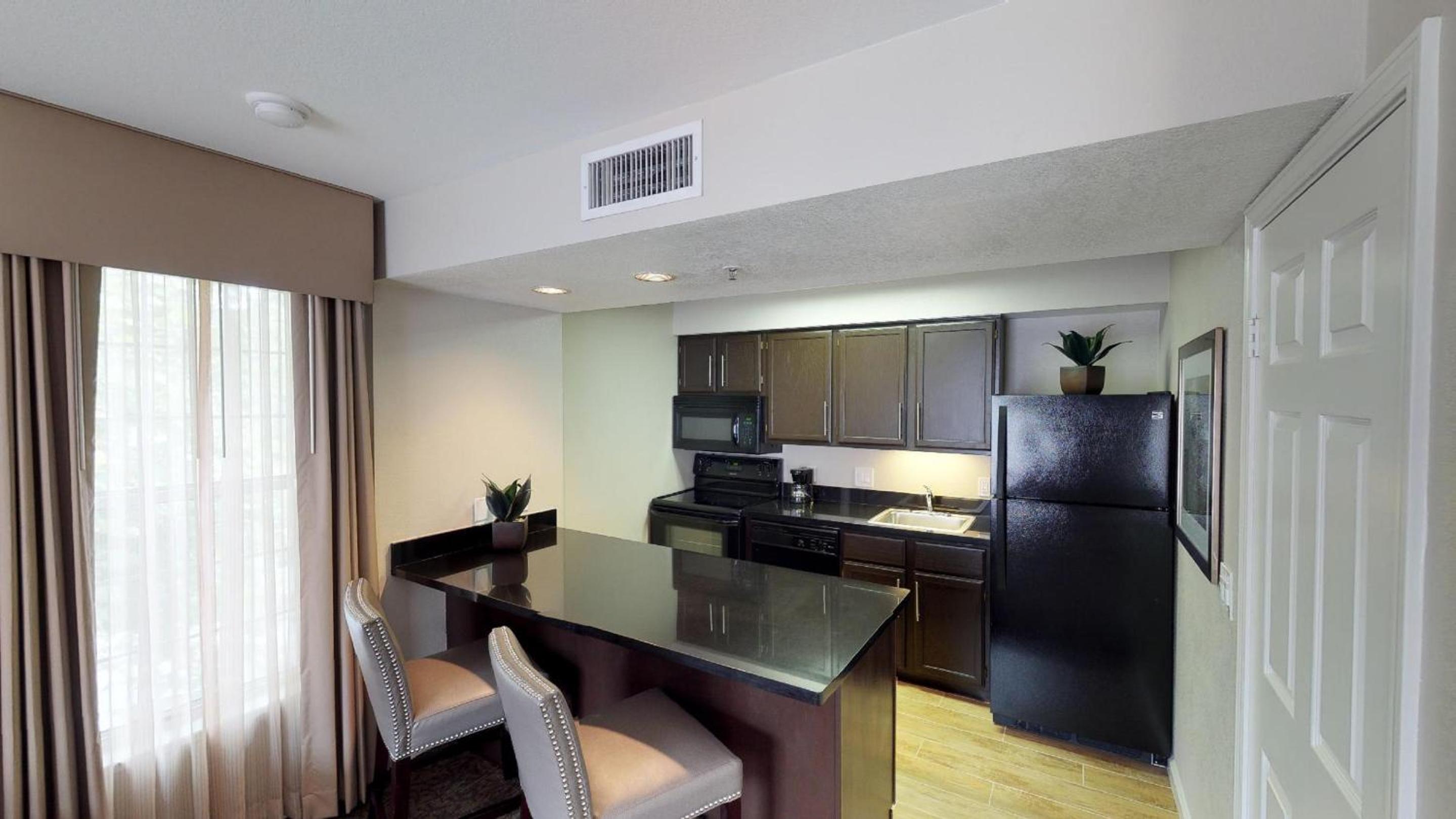 One Bedroom Suite - Full Kitchen - Photo 11