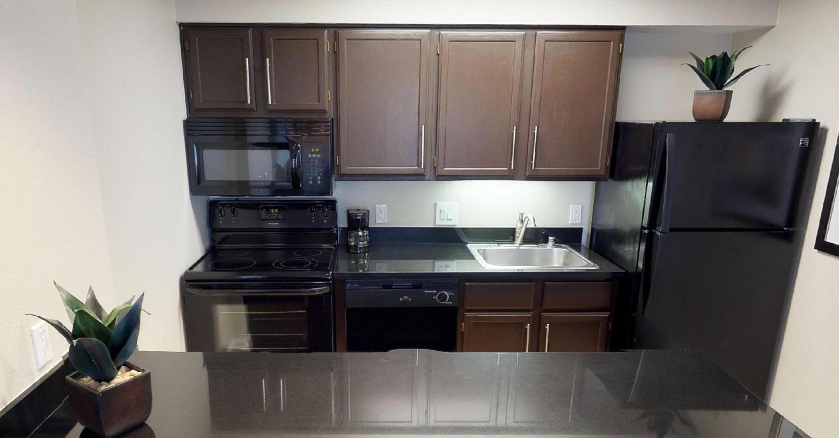 Two Bedroom Suite - Full Kitchen - Photo 4
