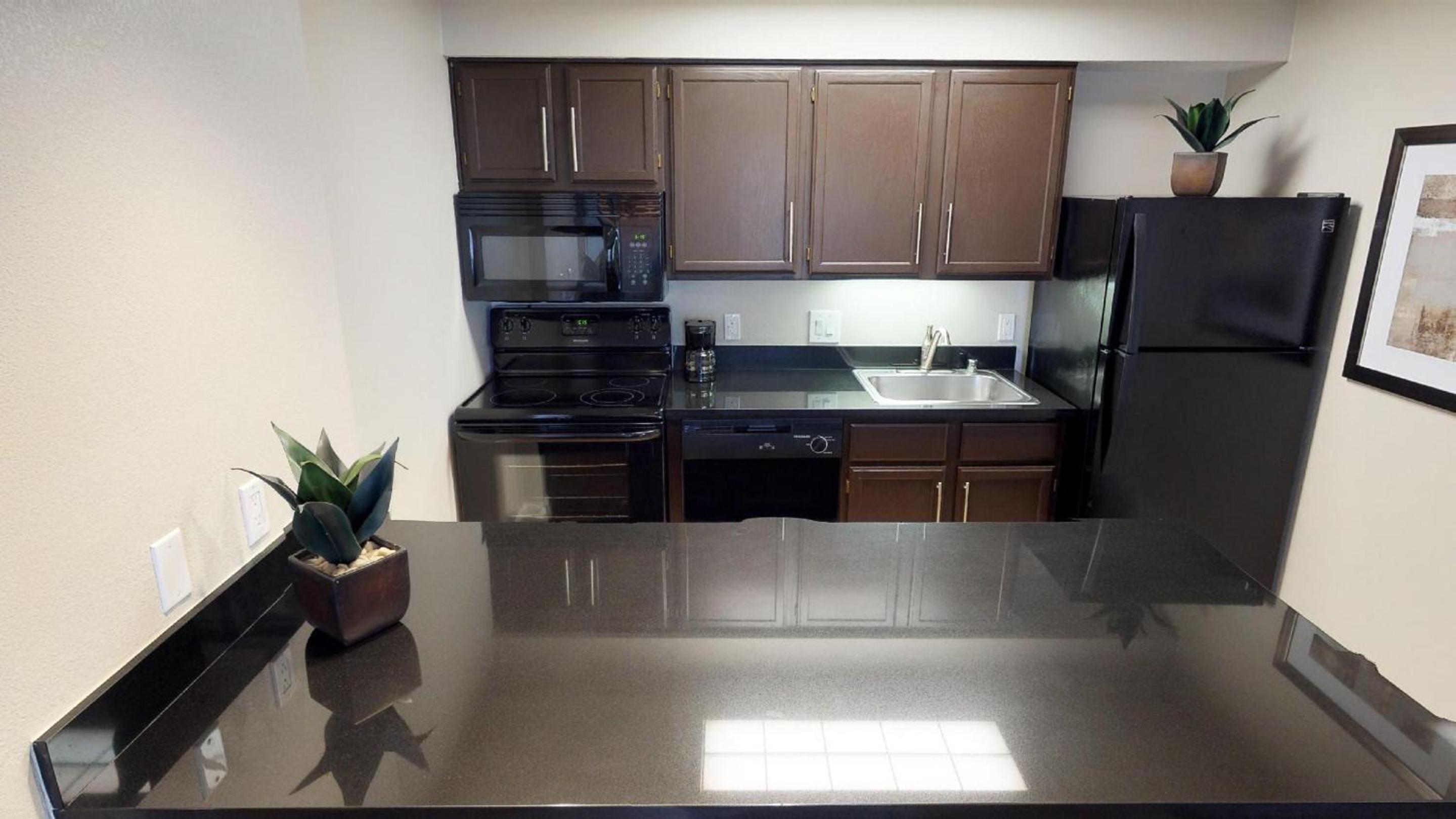 Two Bedroom Suite - Full Kitchen - Photo 5