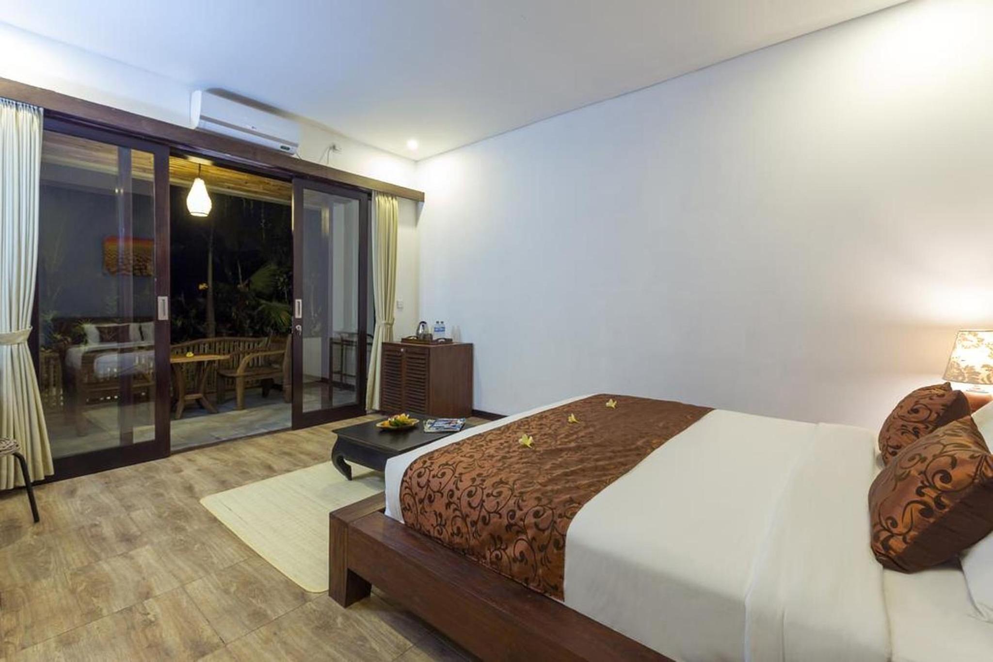 Deluxe Room - Photo 10