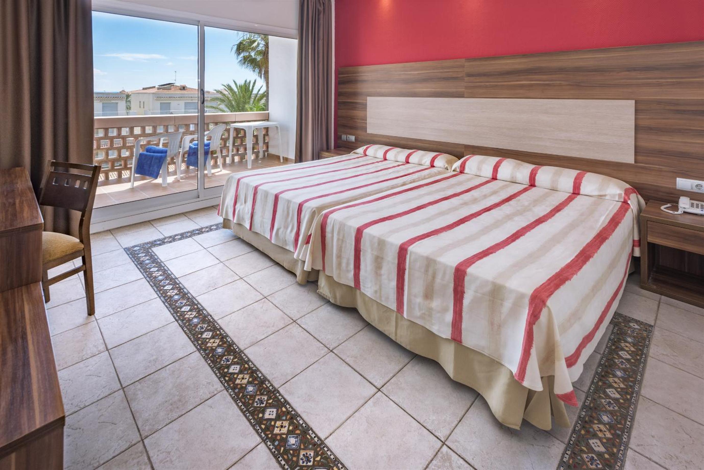 Habitación familiar (2 adultos + 1 niño)