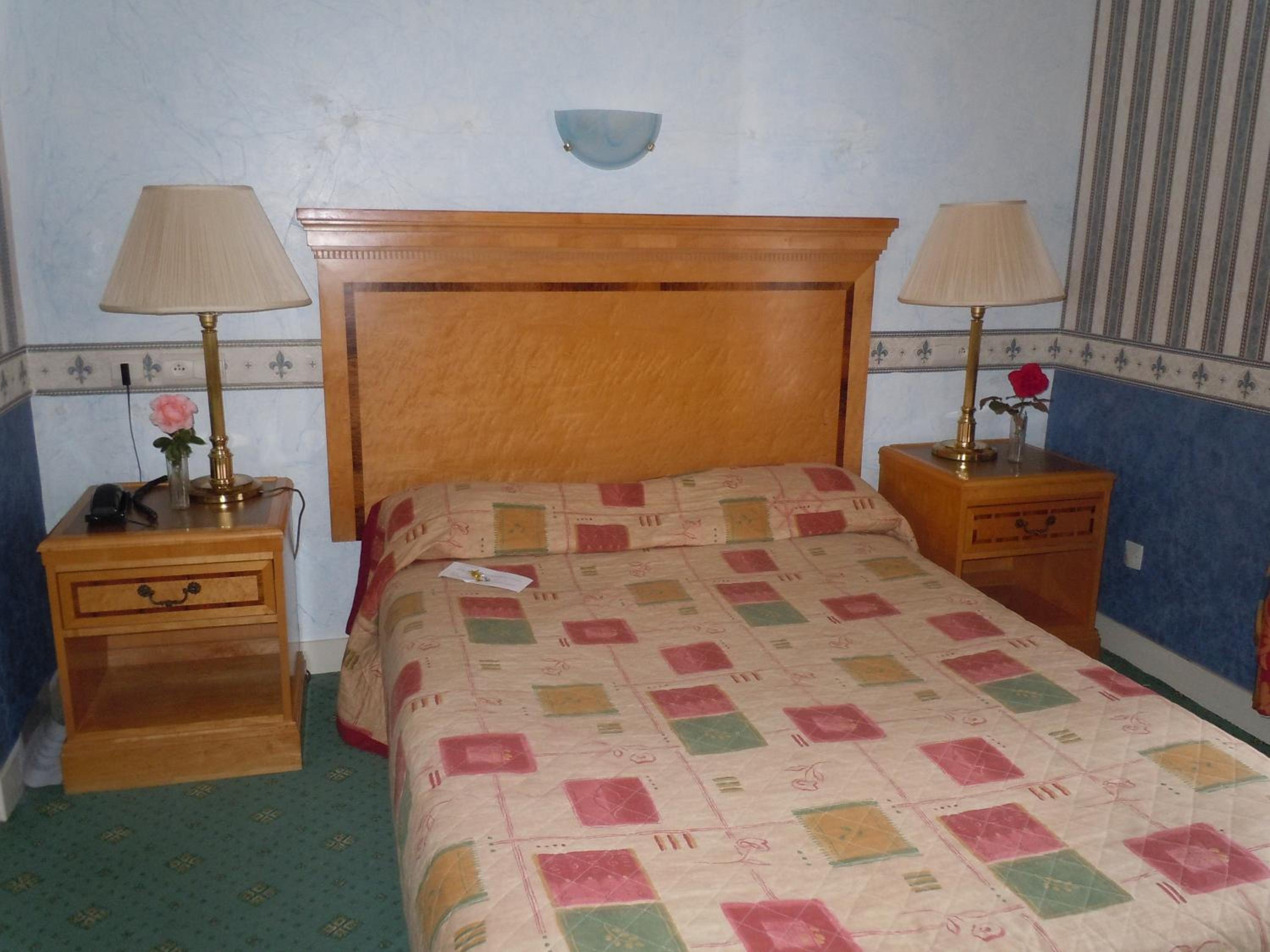 Quadruple Room (1 double bed 2 single beds)
