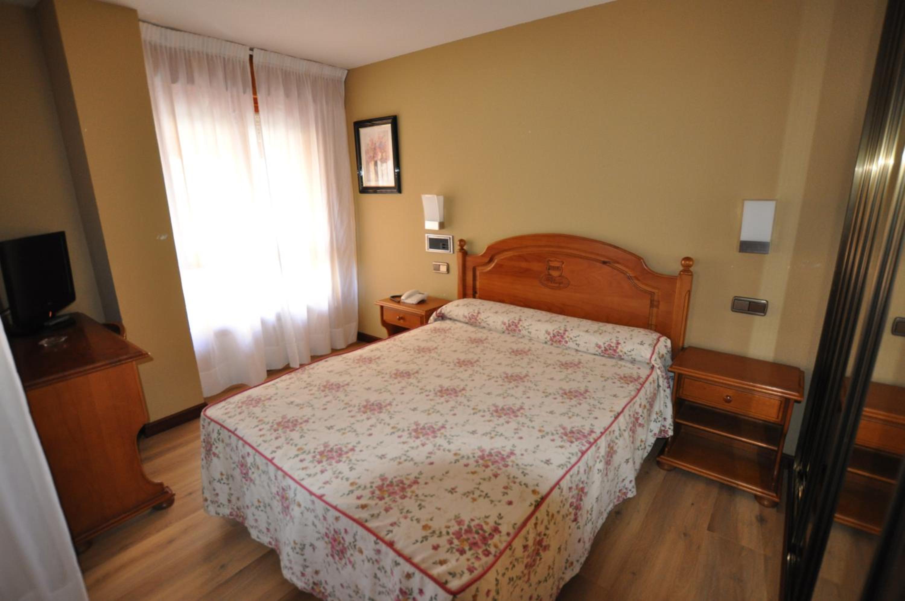 Habitación Estándar con Cama Queen