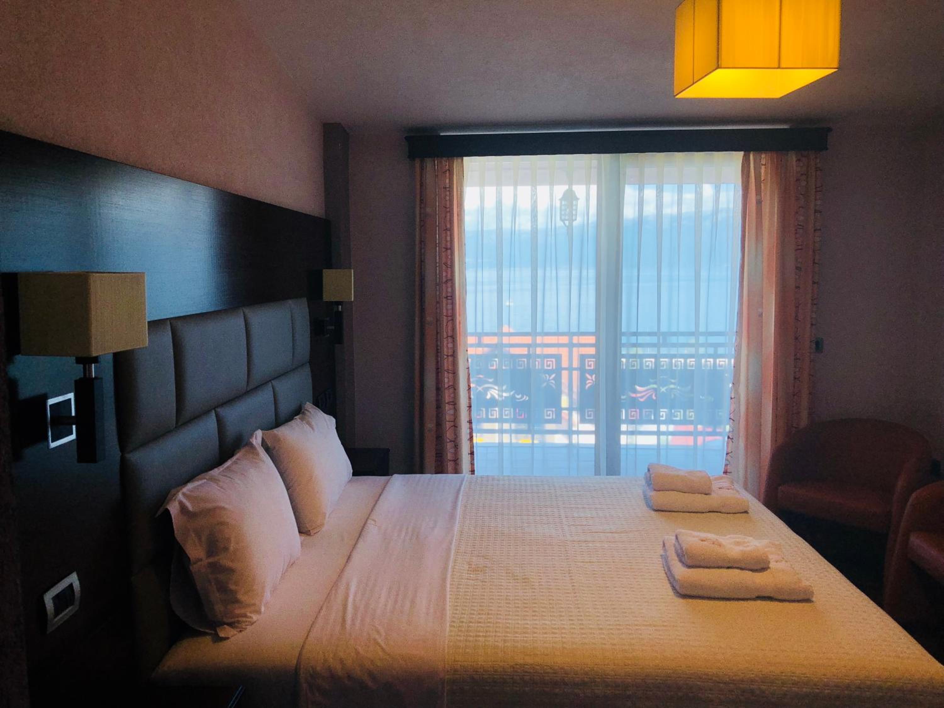 Two-Bedroom Suite with Balcony and Sea View