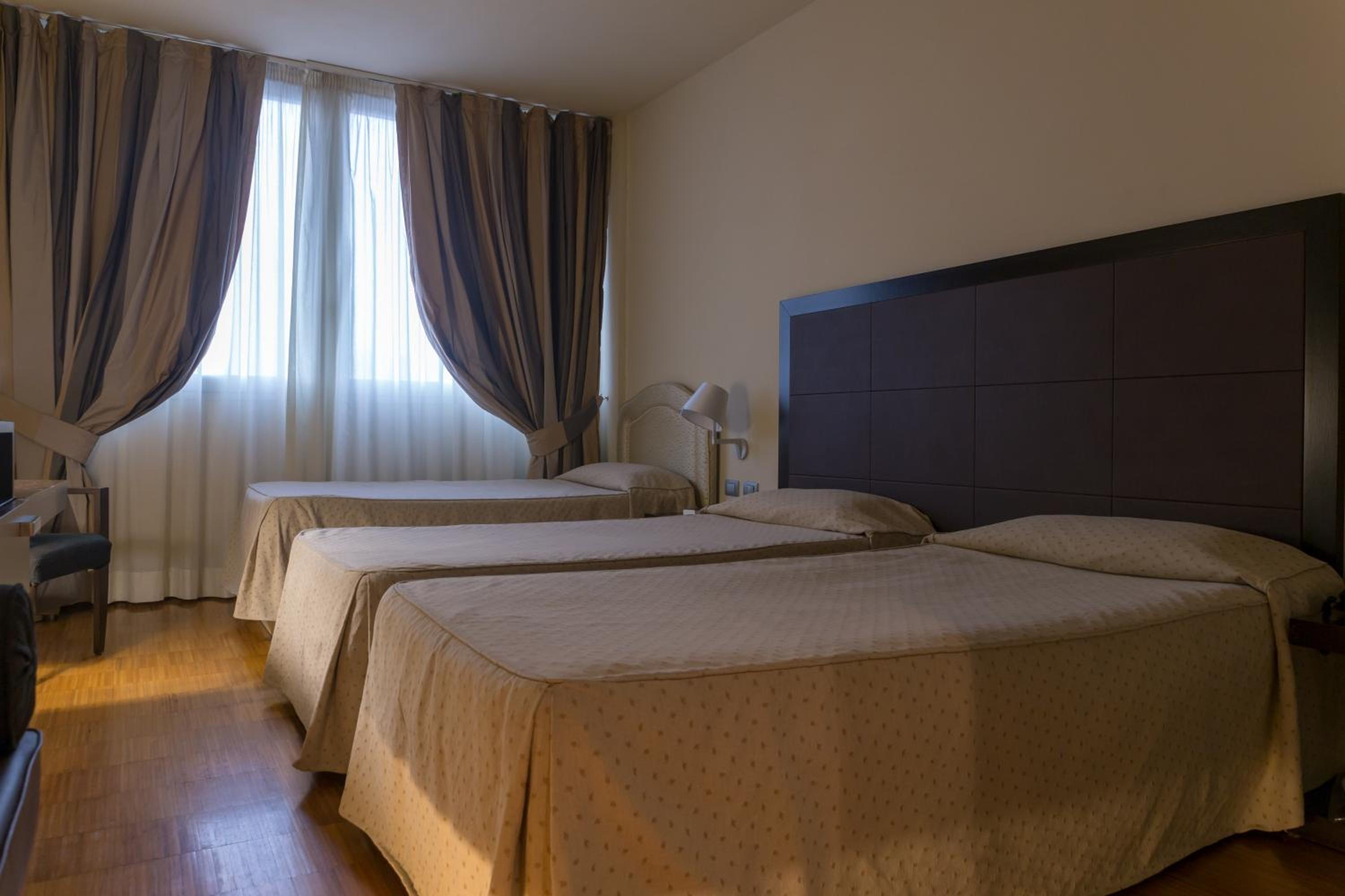 Triple Room - Photo 1