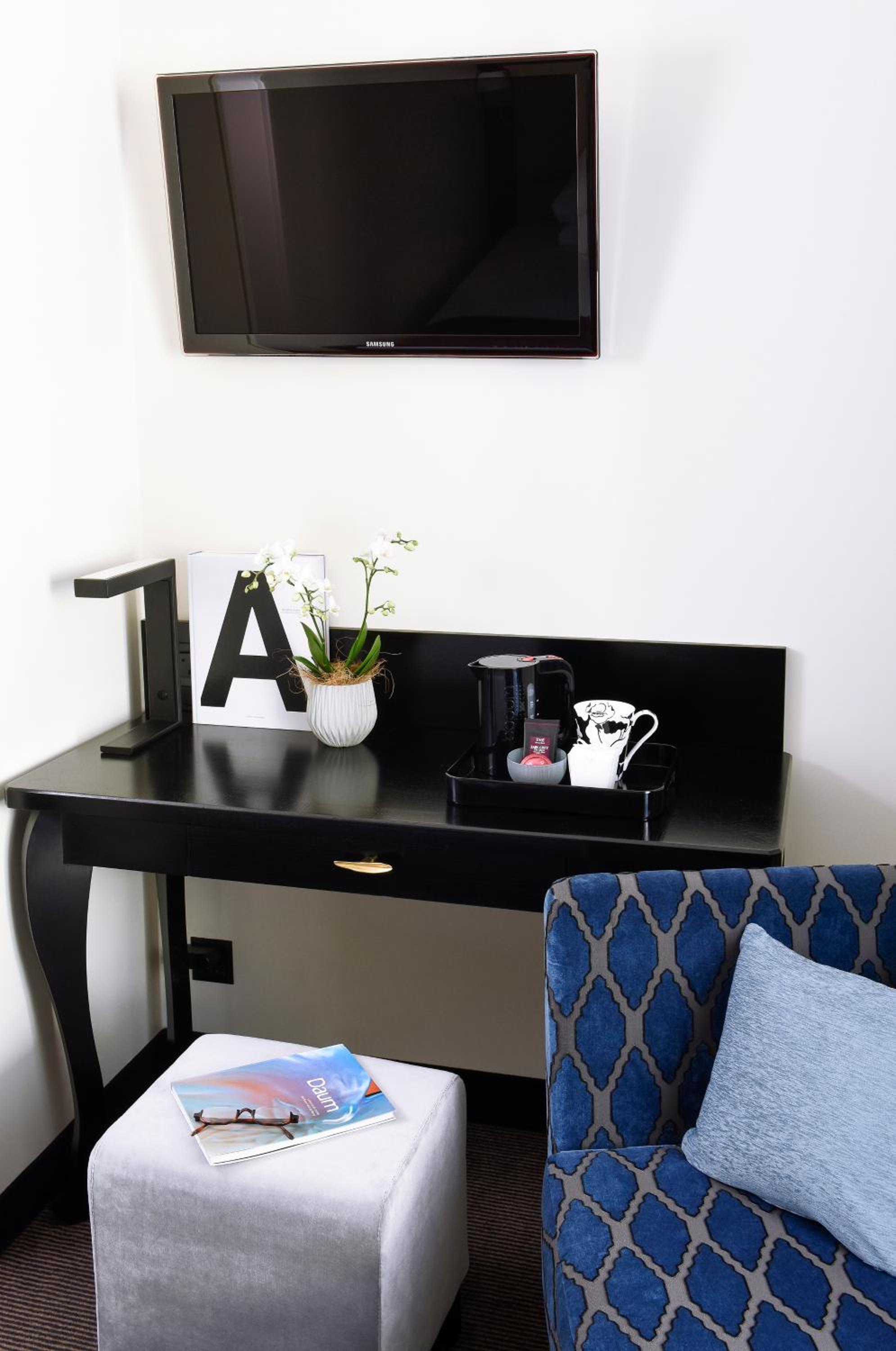 Relax in style with a cozy hotel room retreat.