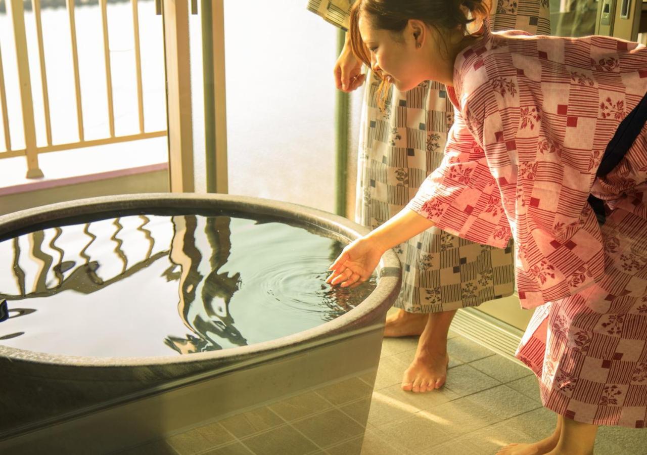 Twin Suite with Tatami Area and Open-Air Bath - Ocean View - High Floor photo 3