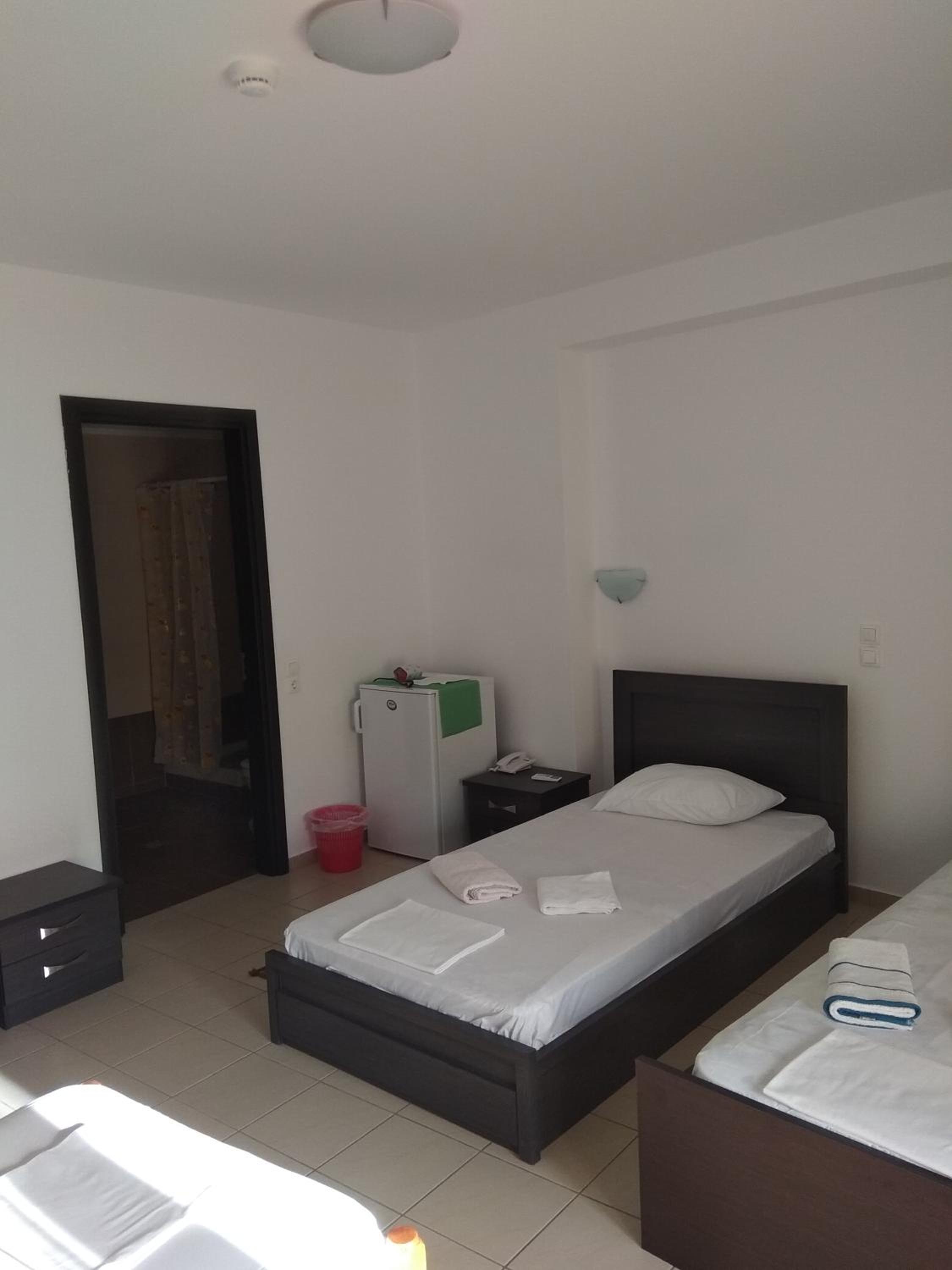 Quadruple Room with Balcony - Photo 17