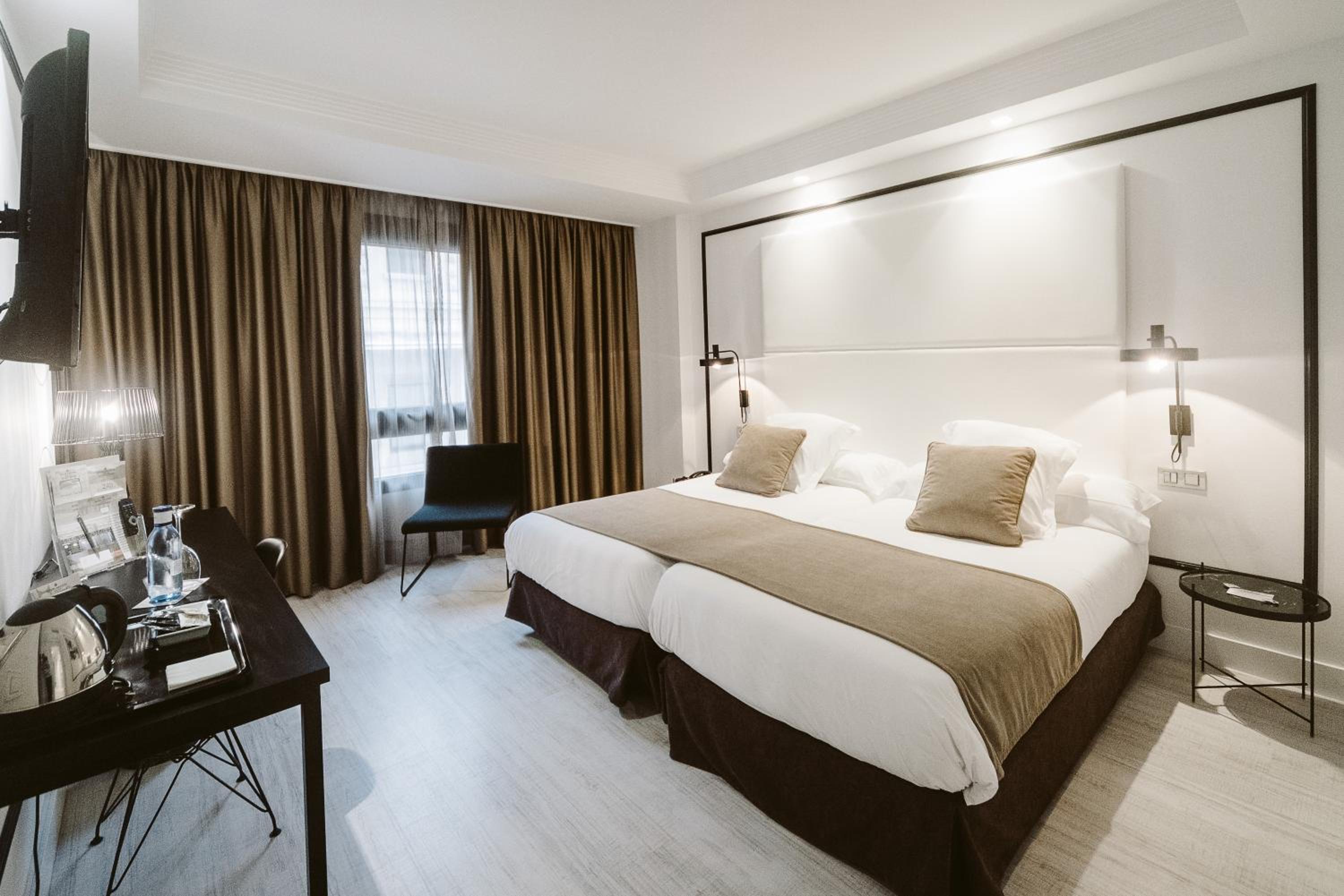 Habitación Doble o con Dos Camas (1-2 Adultos)