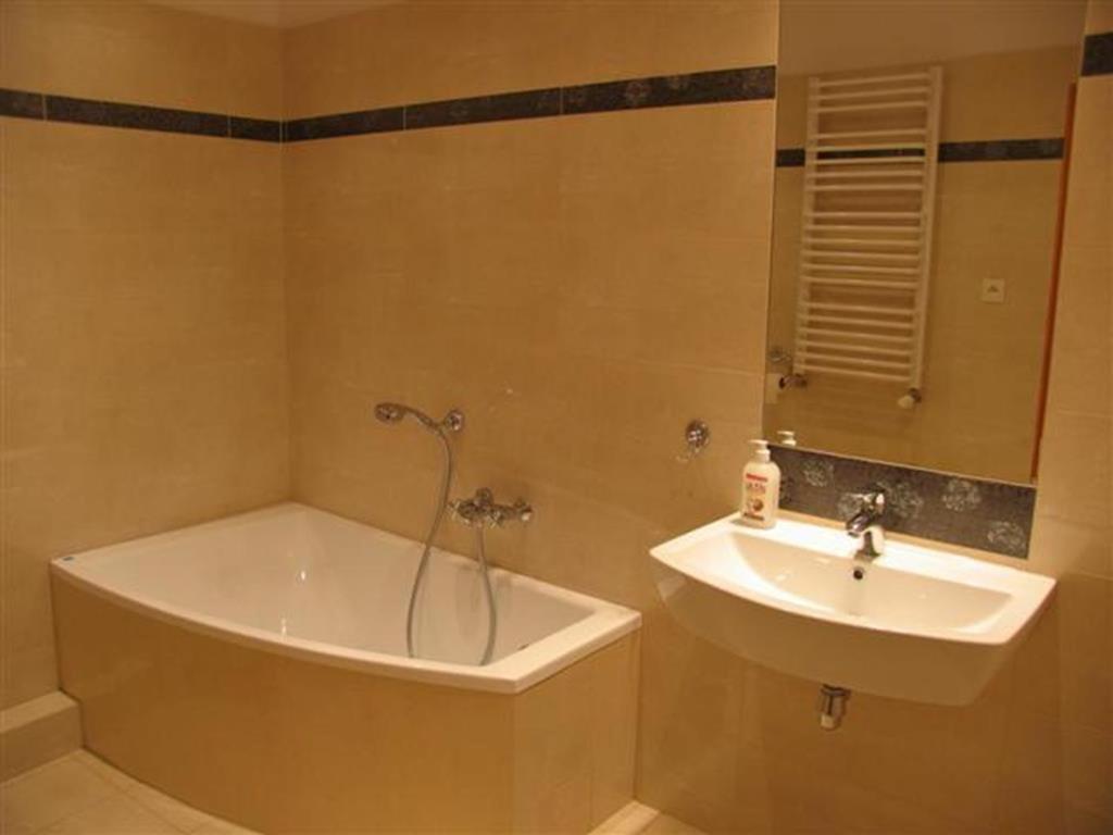 Three-Bedroom Apartment - Photo 13