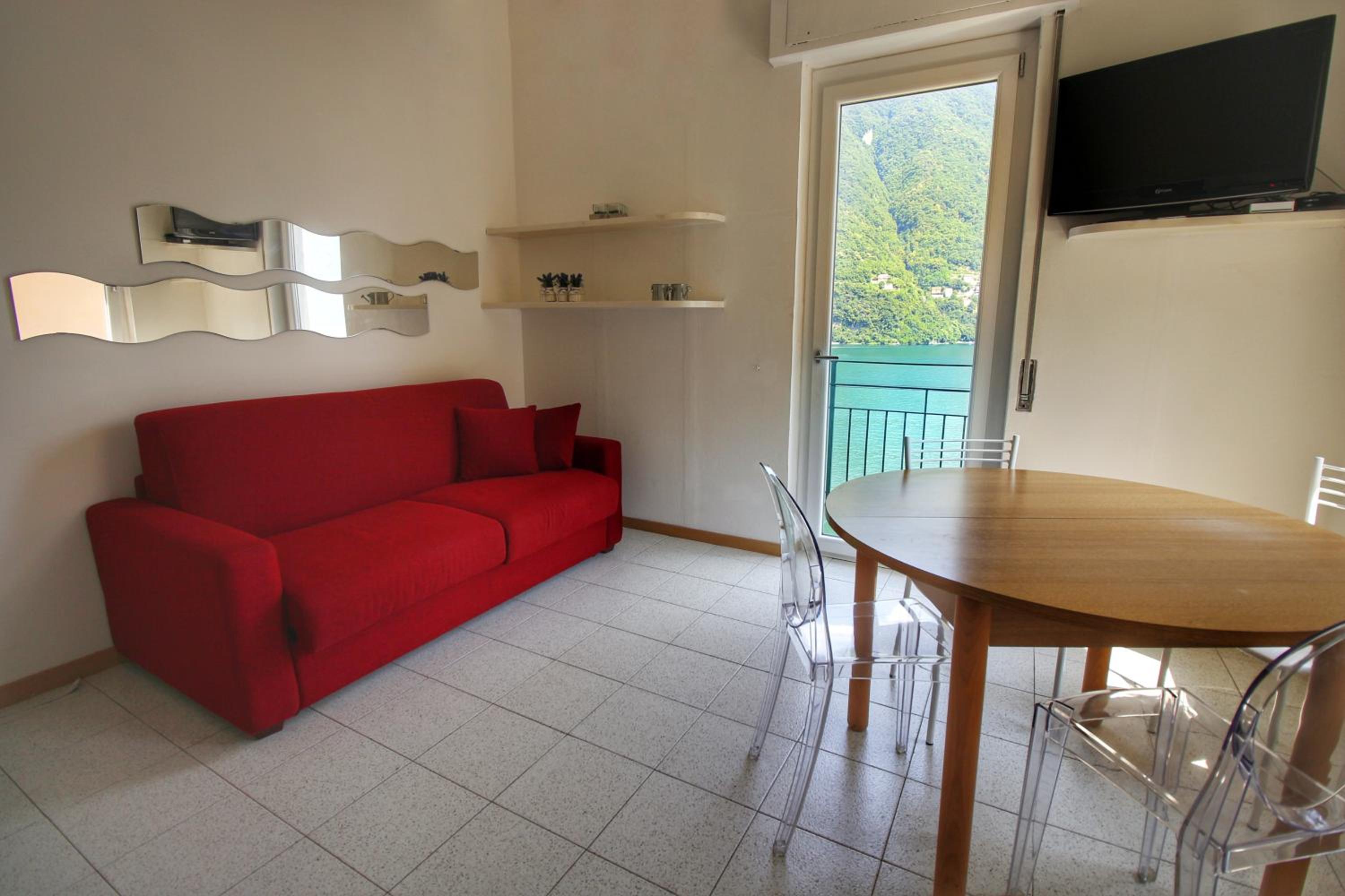 1 Ferienwohnung mit Seeblick und Terrasse - Separates Gebäude