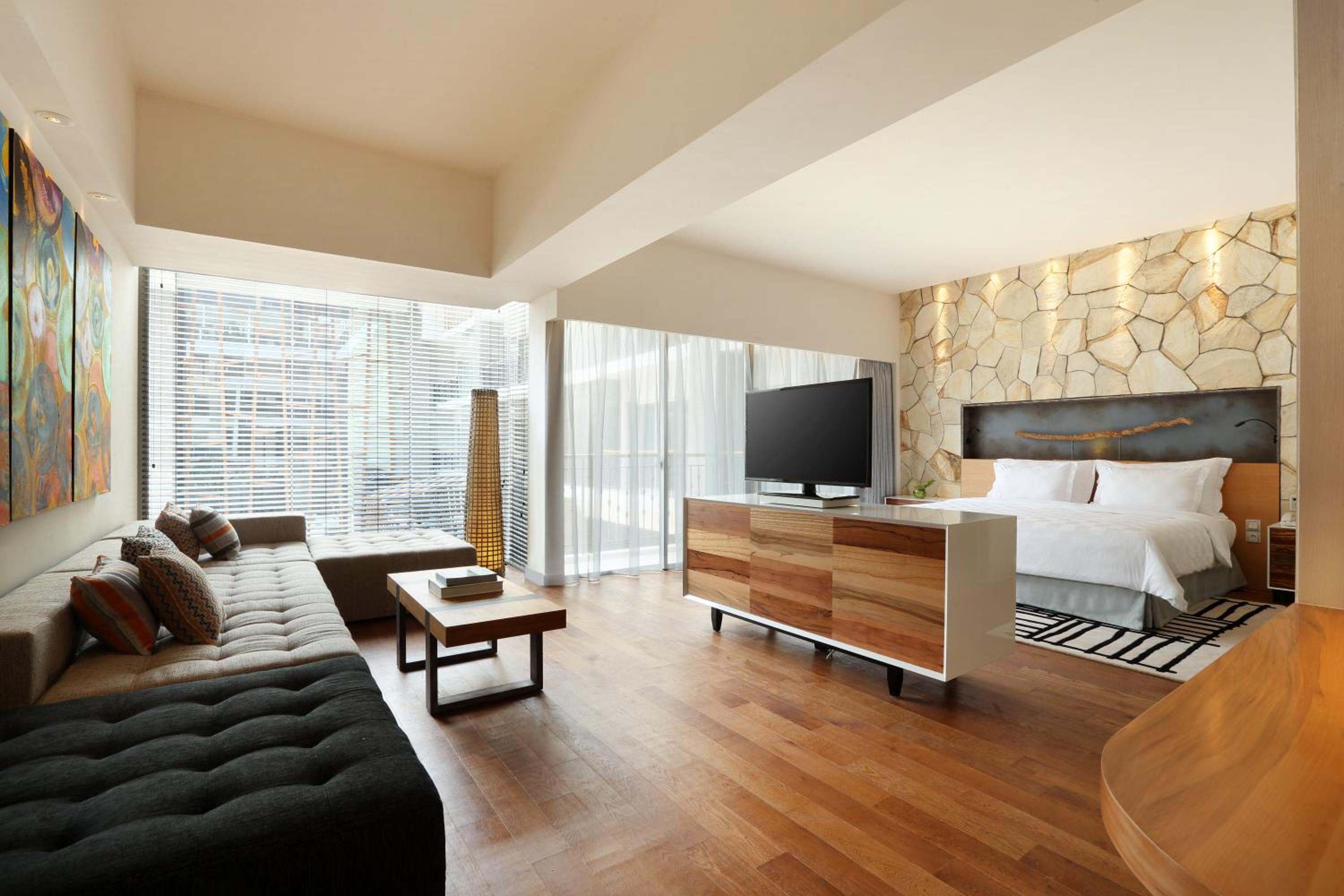 TSand Suite with All Day Breakfast, Daily Restocked Mini-bar and other Free Benefits