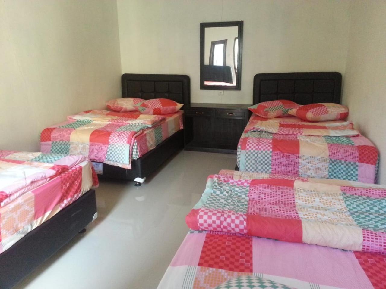 Quadruple Room with Shared Bathroom