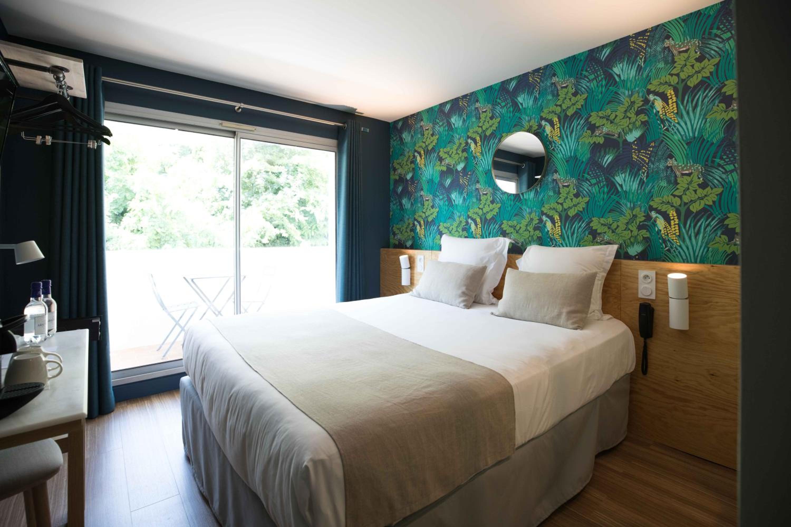 Deluxe Queen Room - Photo 4