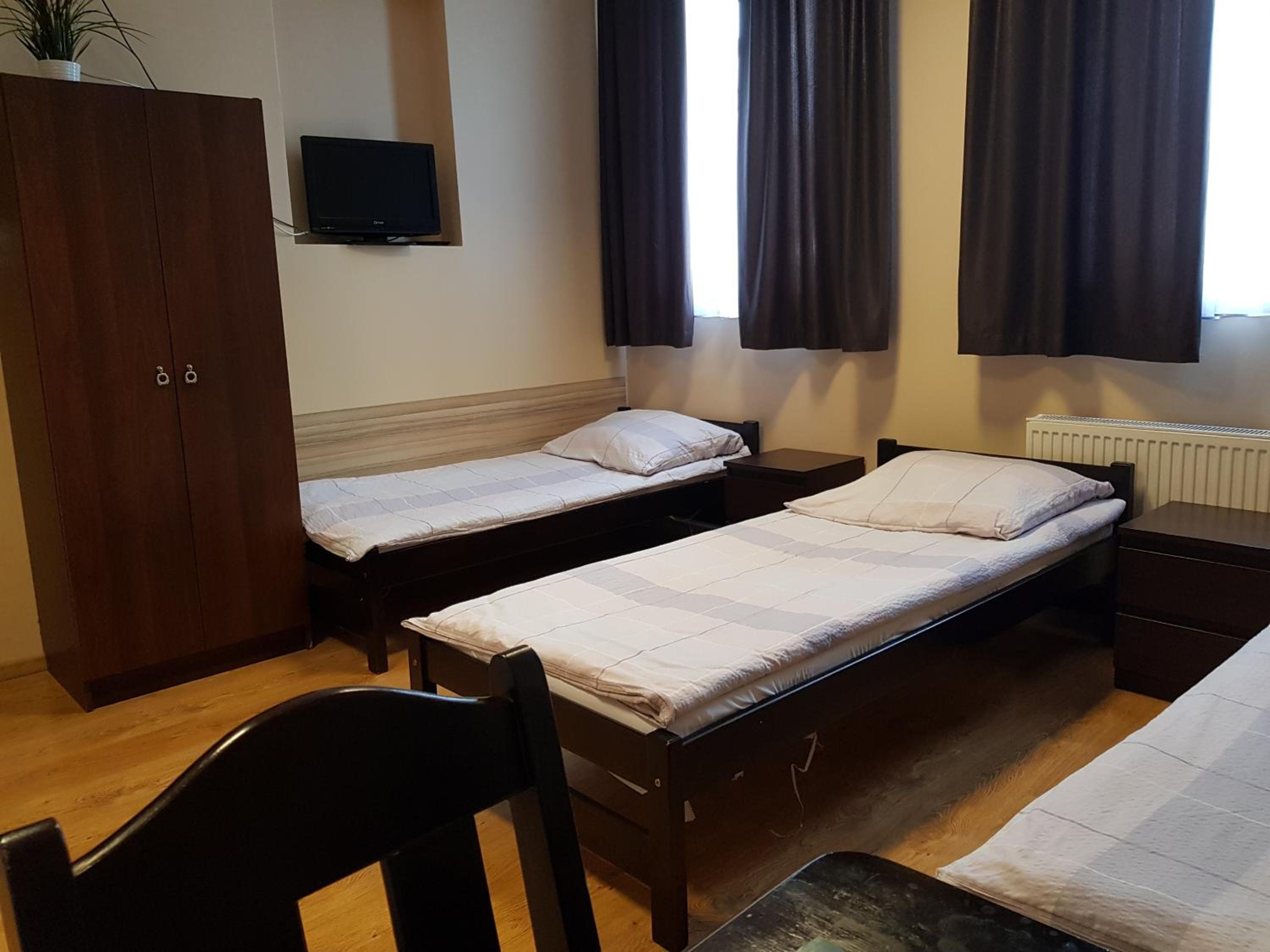 Quadruple Room with Private Bathroom