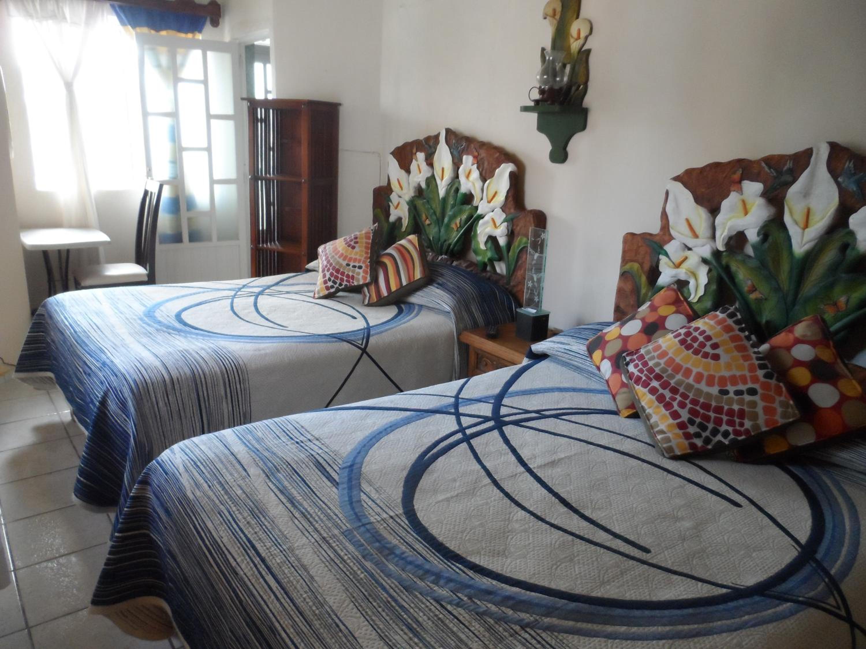 Quadruple Room with Balcony - Photo 1