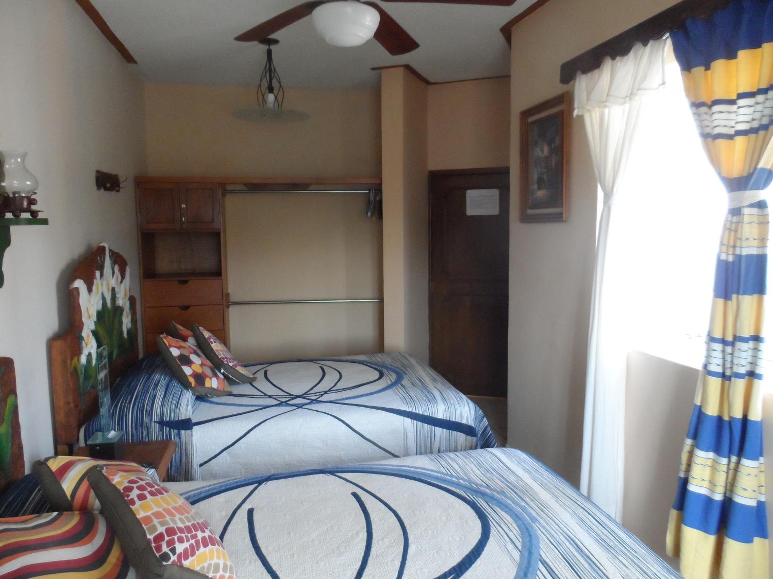 Quadruple Room with Balcony - Photo 5