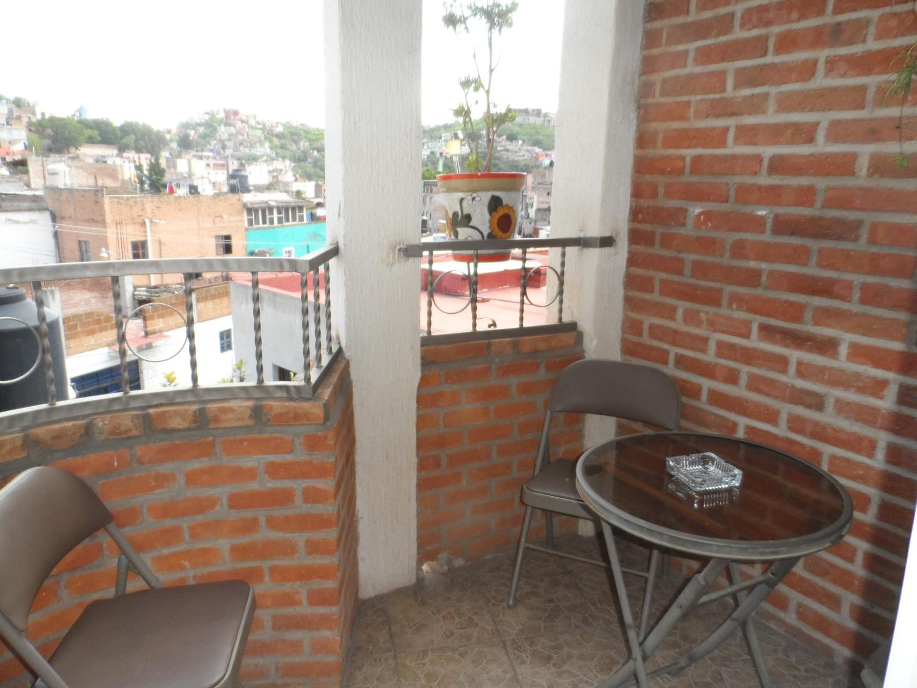 Quadruple Room with Balcony - Photo 2