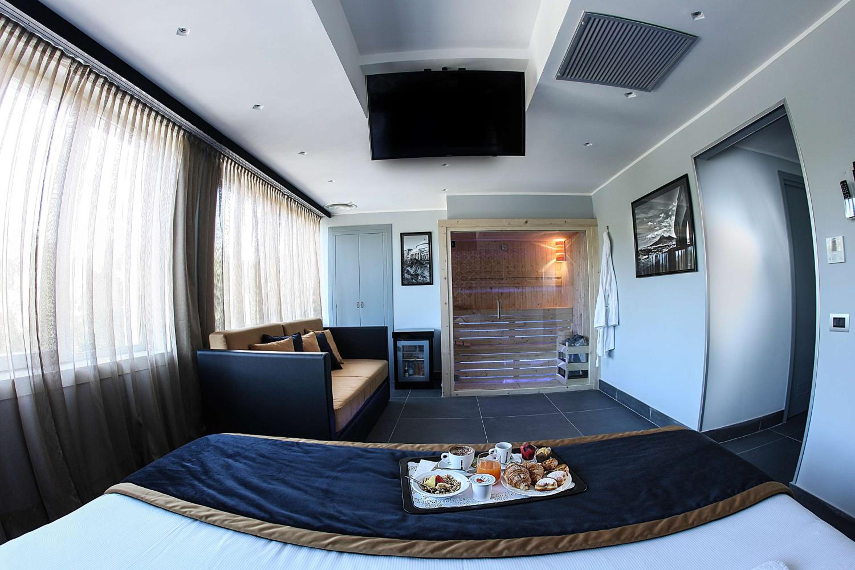 Deluxe King Room with Sofa Bed photo 1