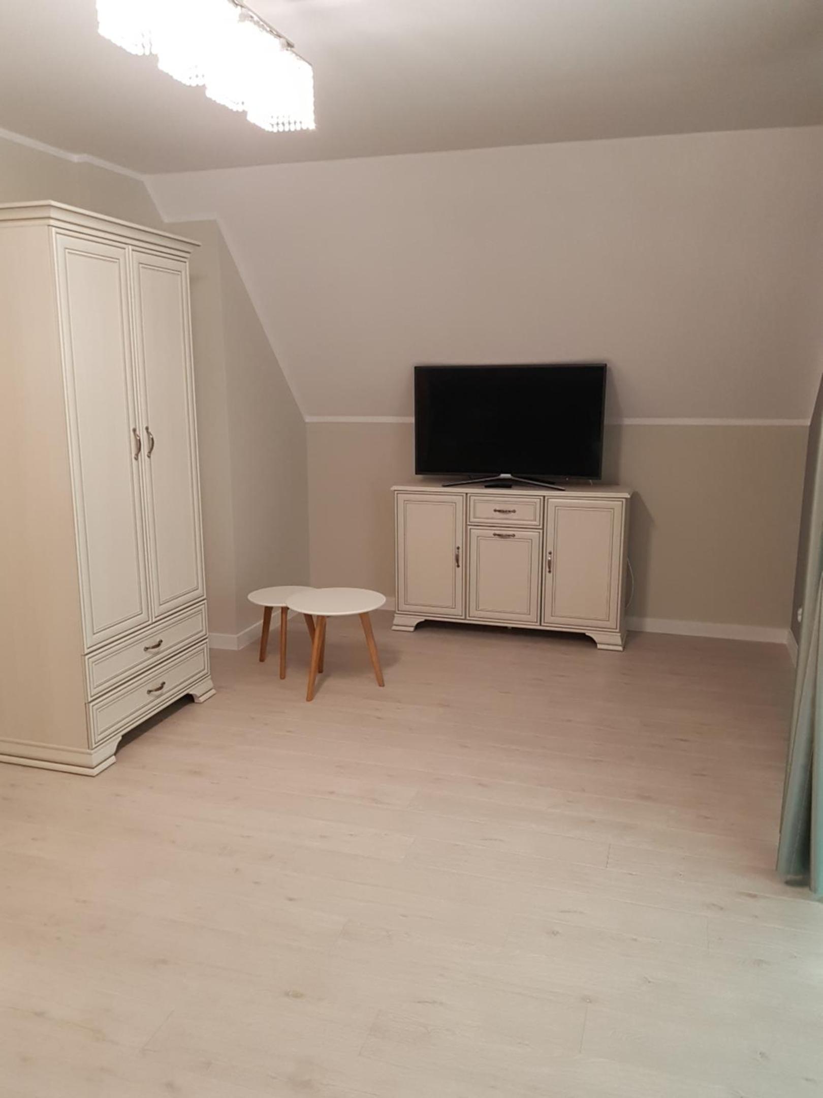 Three-Bedroom Apartment - Photo 2