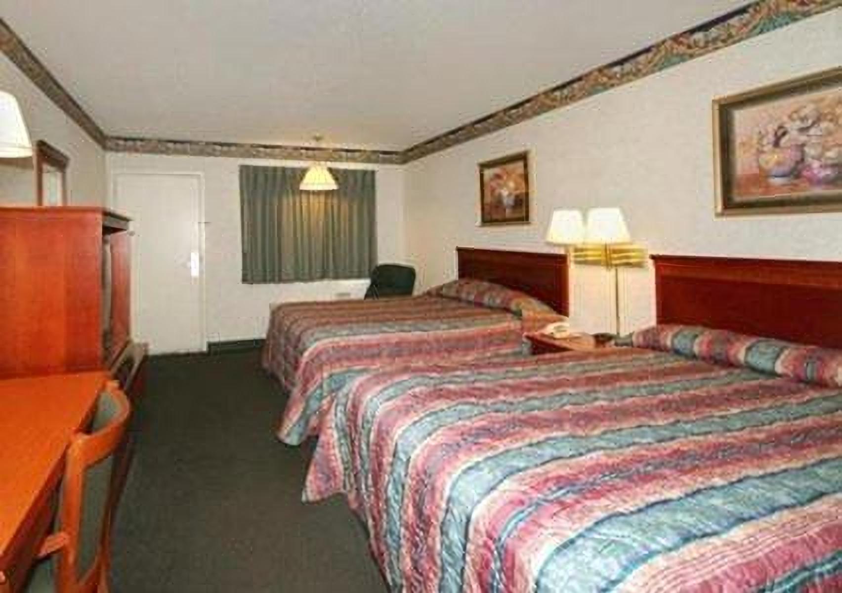 Standard Queen Room with Two Queen Beds - Non-Smoking photo 1