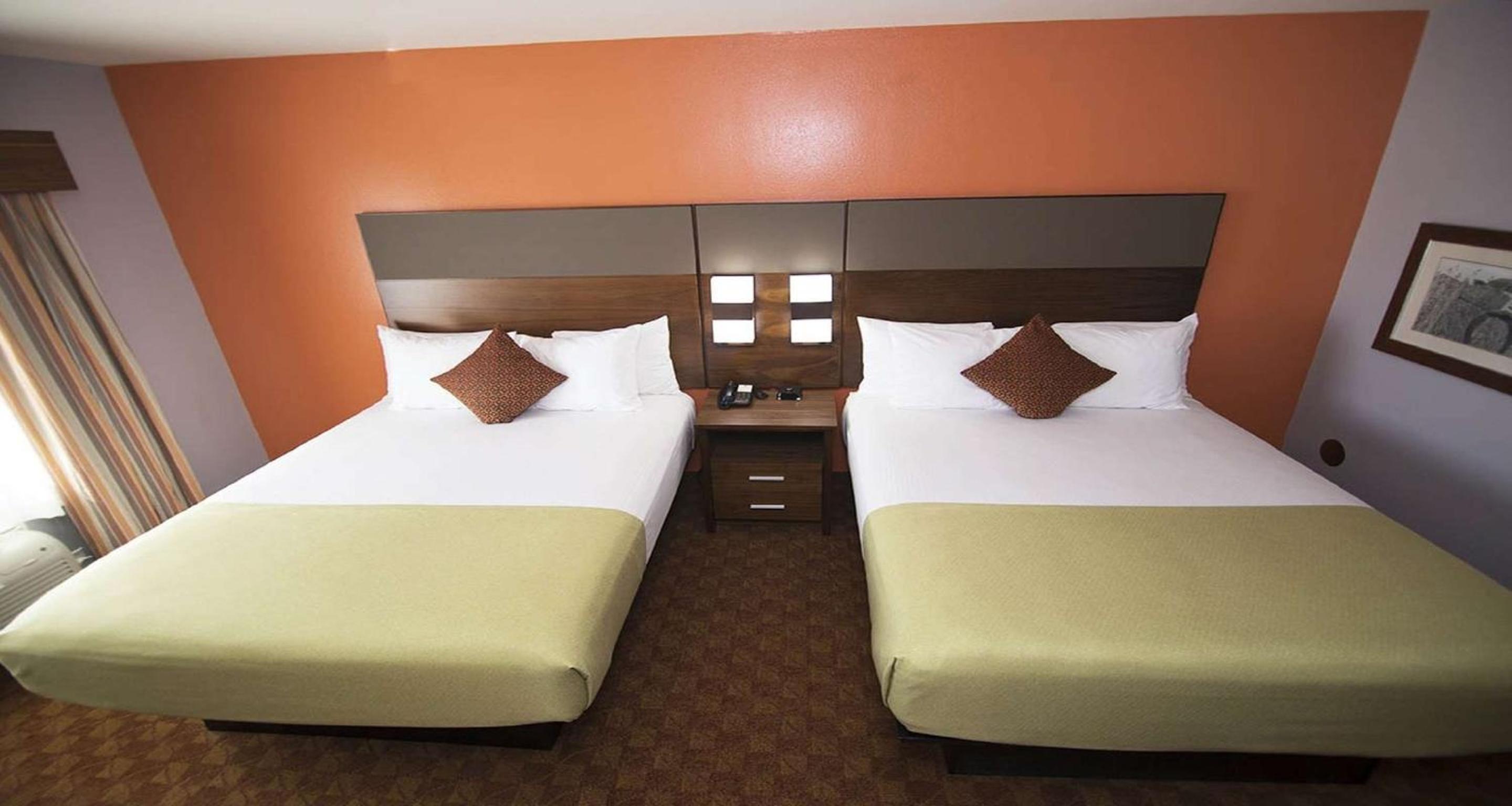 Queen Room with Two Queen Beds - Non-Smoking - Photo 1
