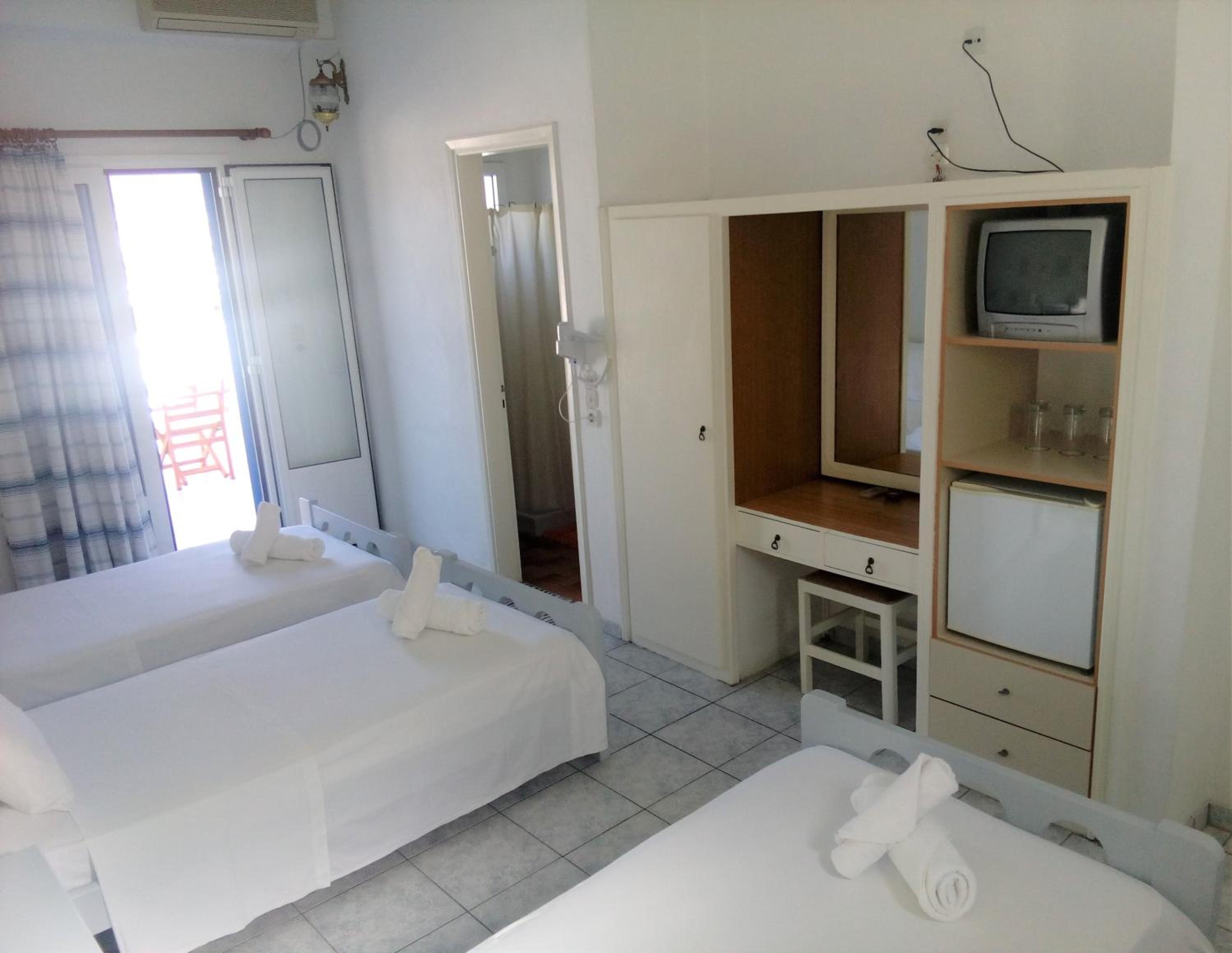 Quarto Triplo com Vista para o Mar