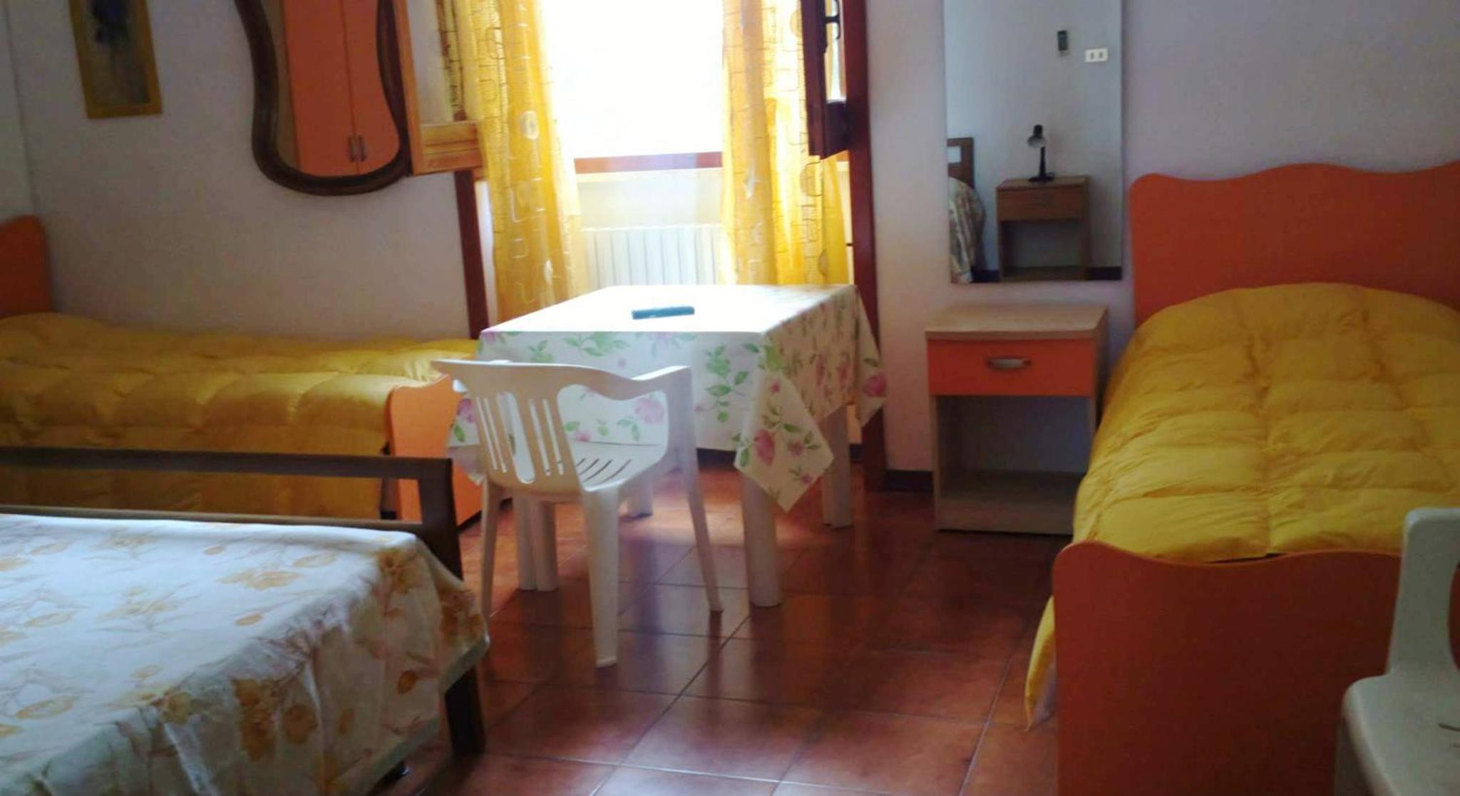 Quadruple Room with Private Bathroom