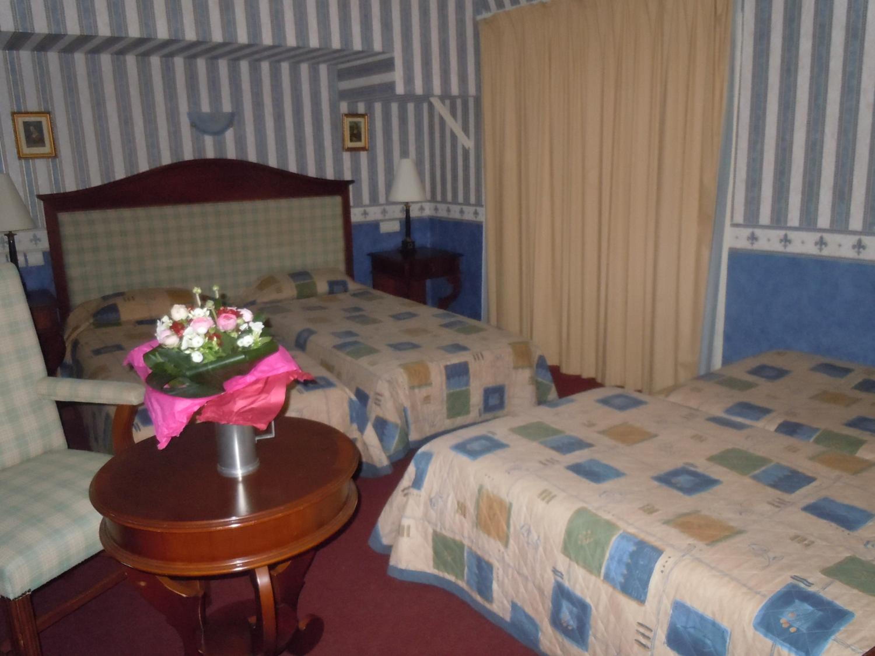 Quadruple Room (4 single beds)