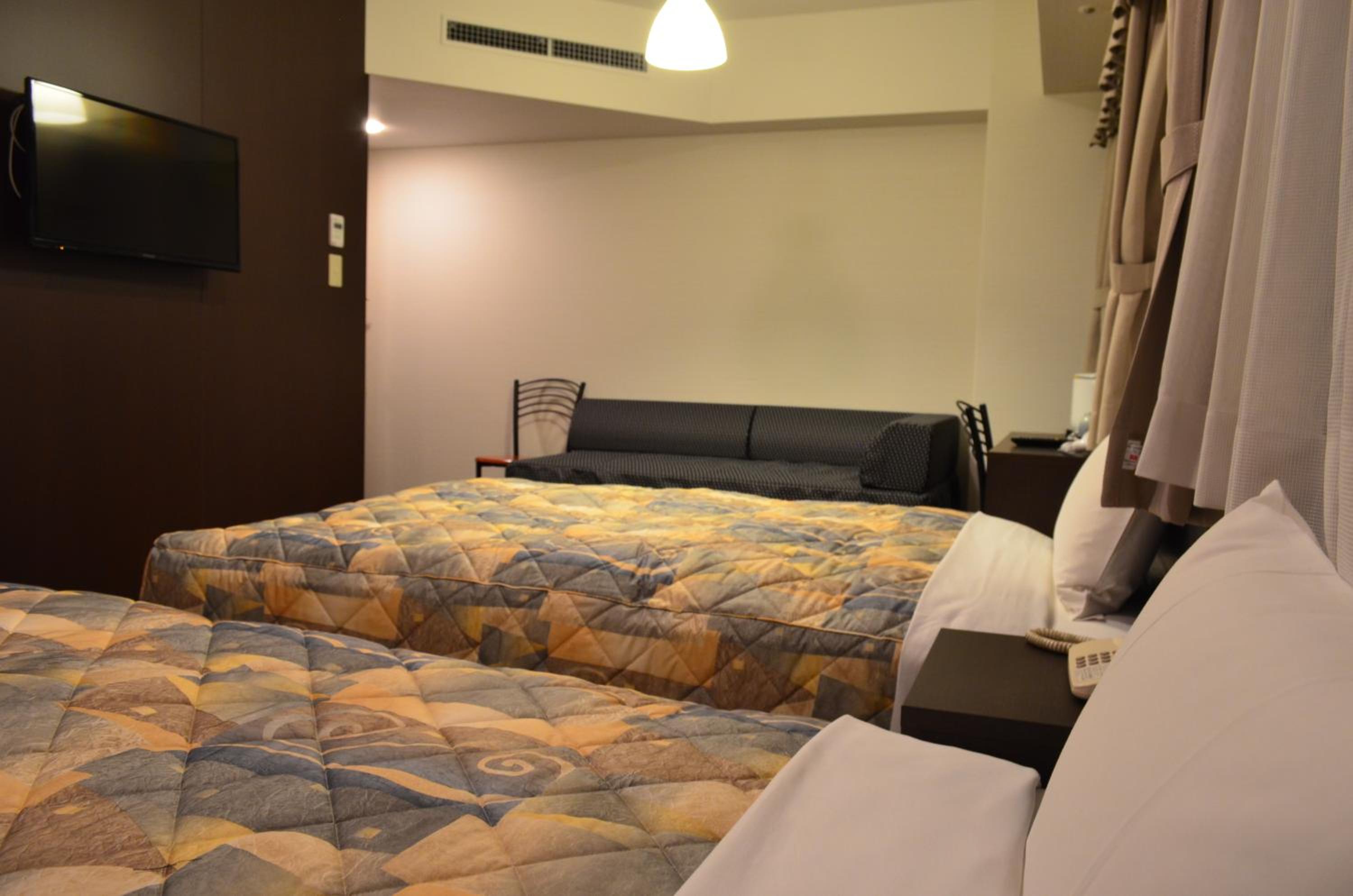 Premium Twin Room with City View (10th Floor) - Non Smoking photo 1