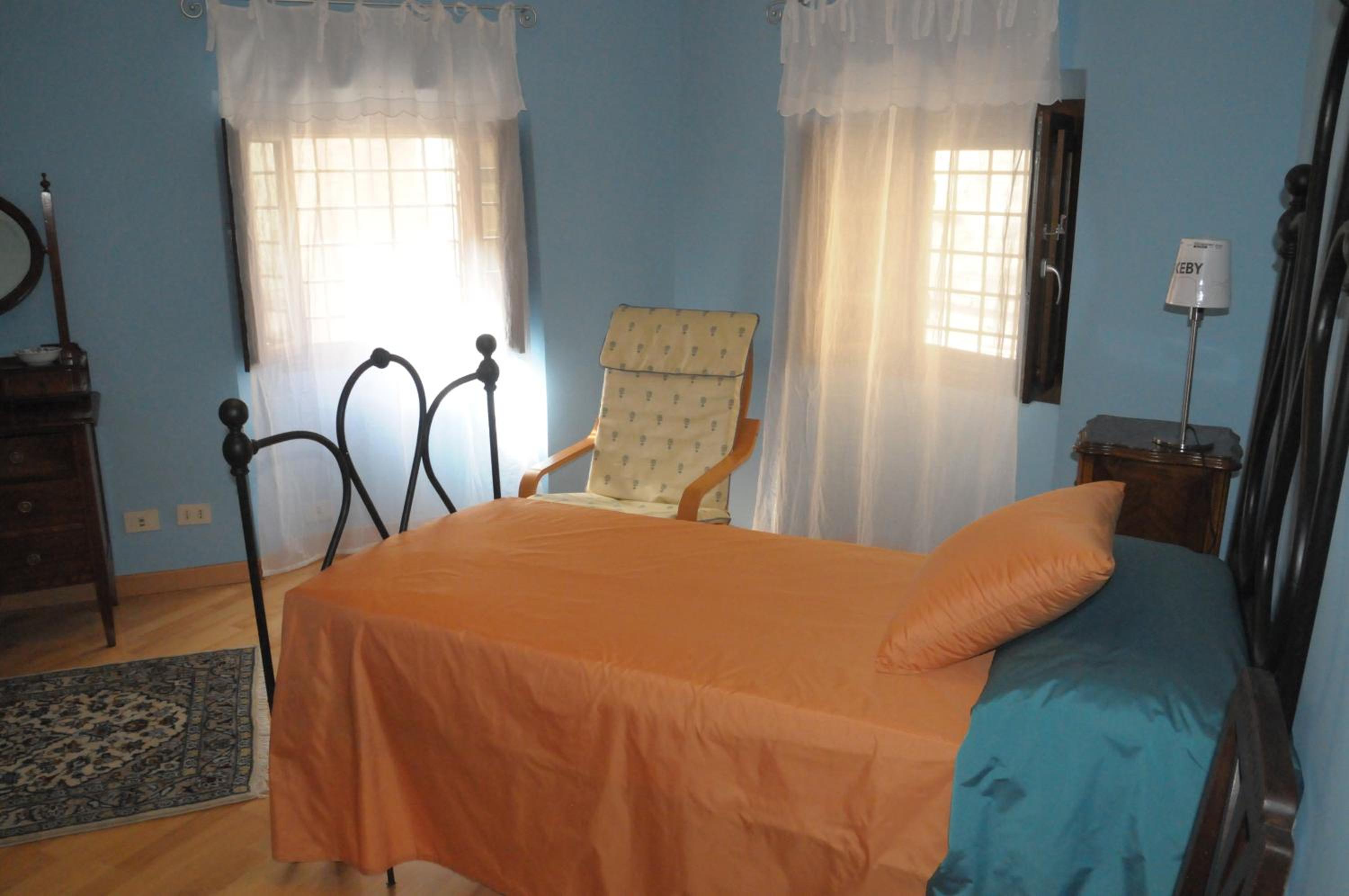 Three-Bedroom House - Photo 18