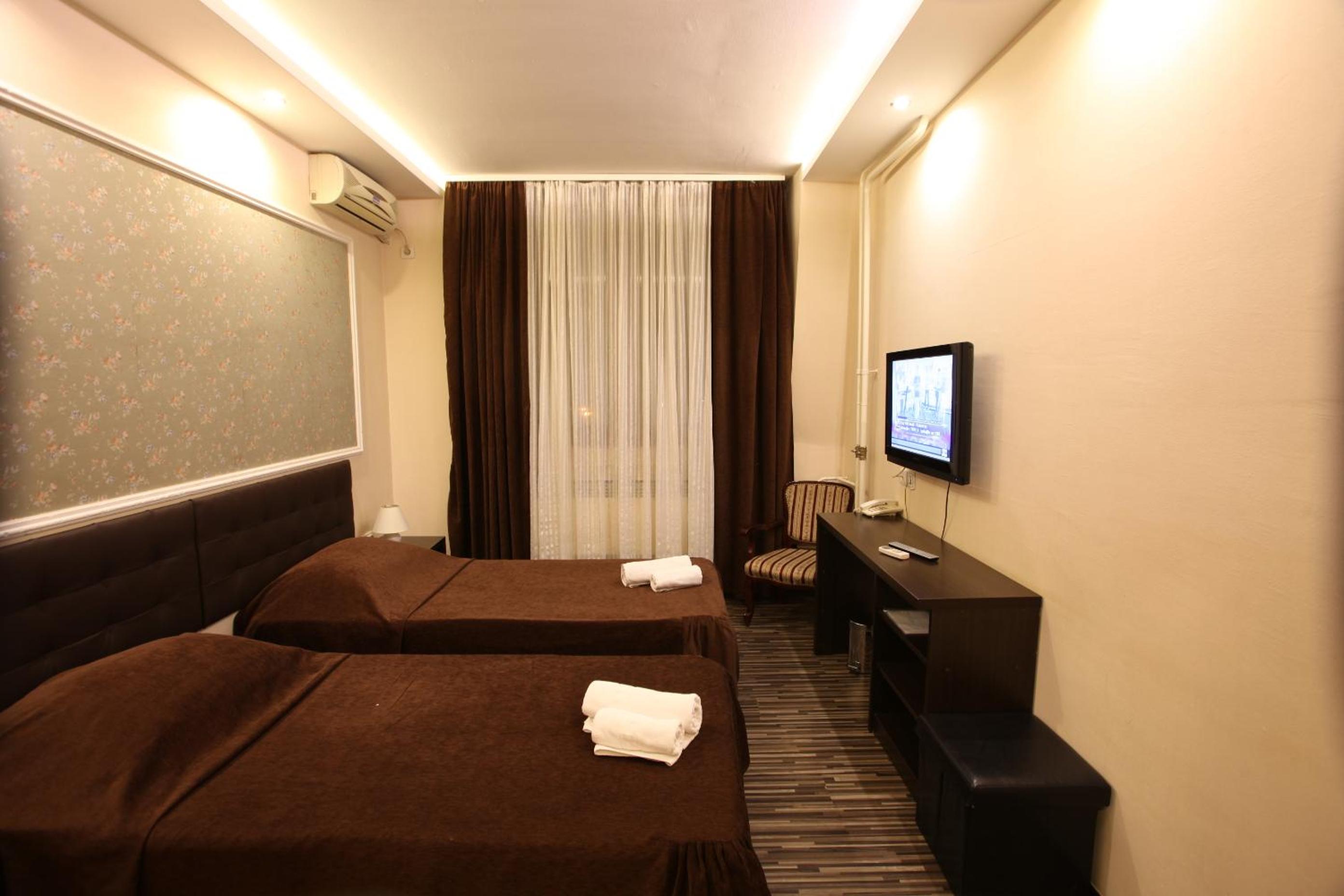 Standard Triple Room - Photo 1
