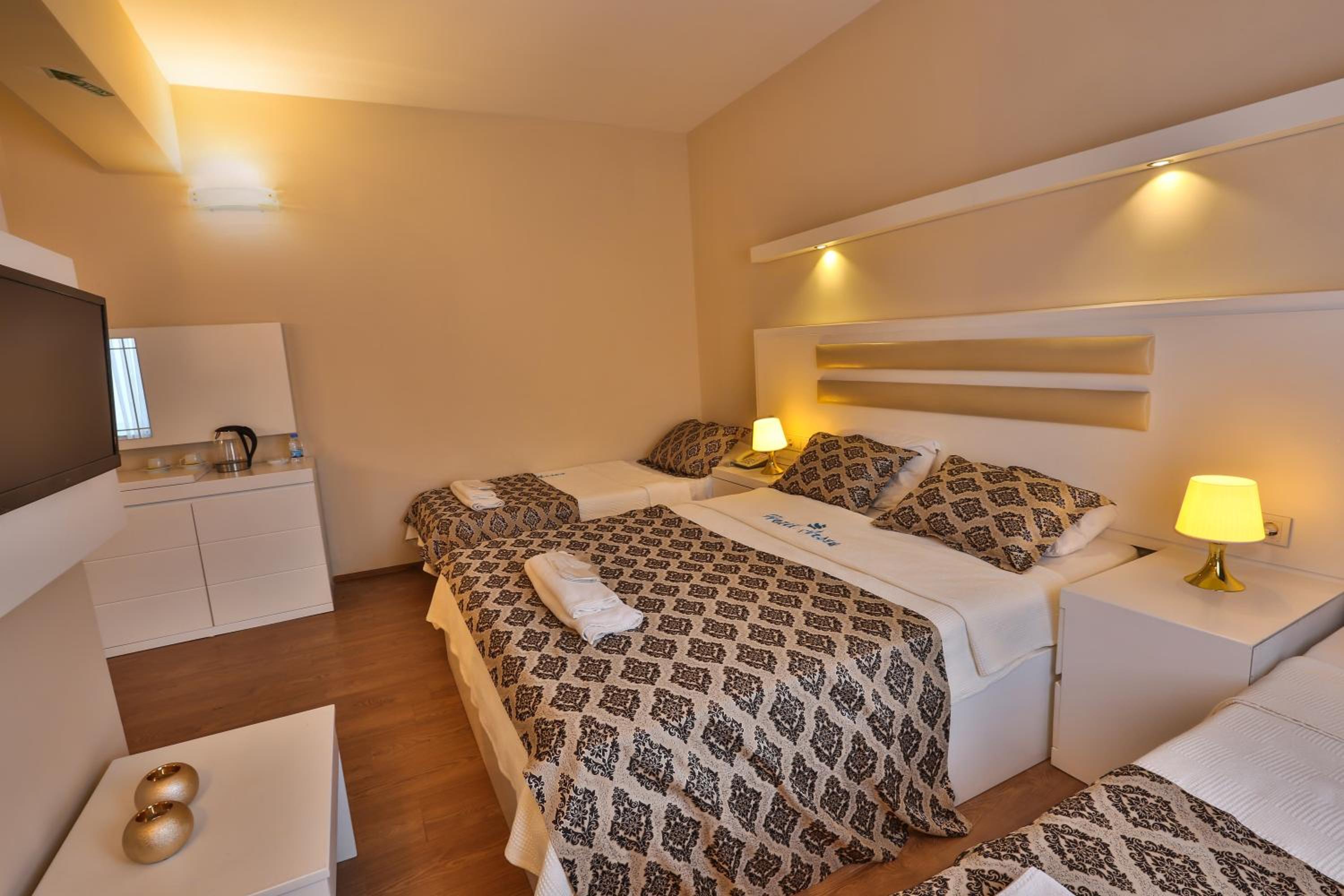 Standard Quadruple Room - Photo 6
